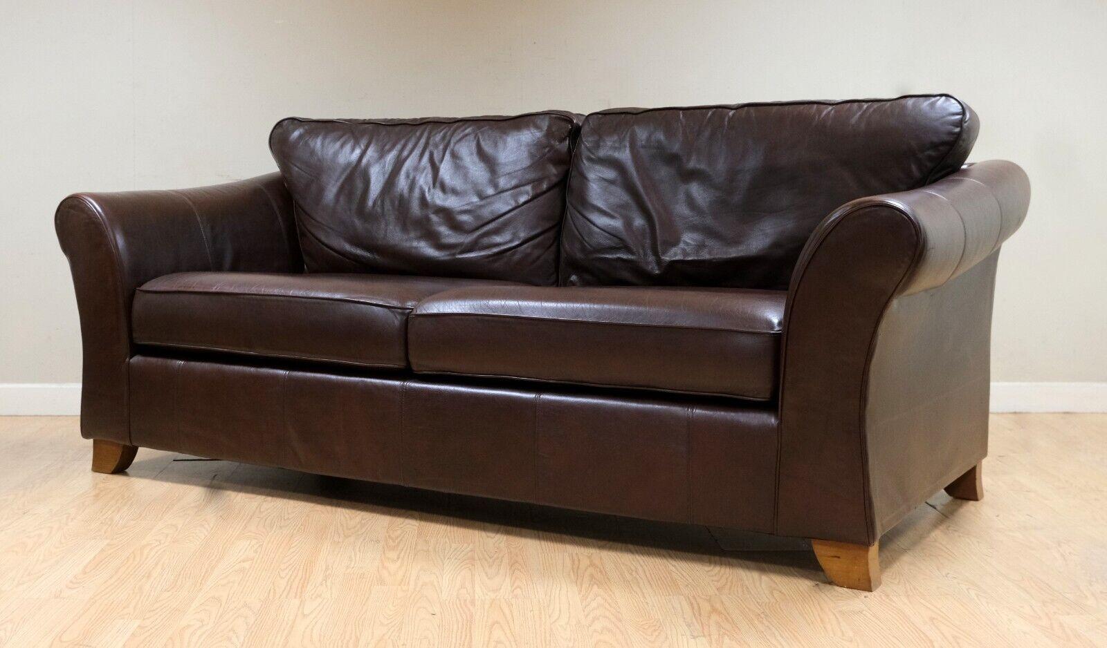 We are delighted to offer for sale this elegant Marks & Spencer Abbey collection brown leather two seater sofa.

This sothiphicated and soft leather sofa is ideal for any living room style, as the design will never be out of fashion. Marks &