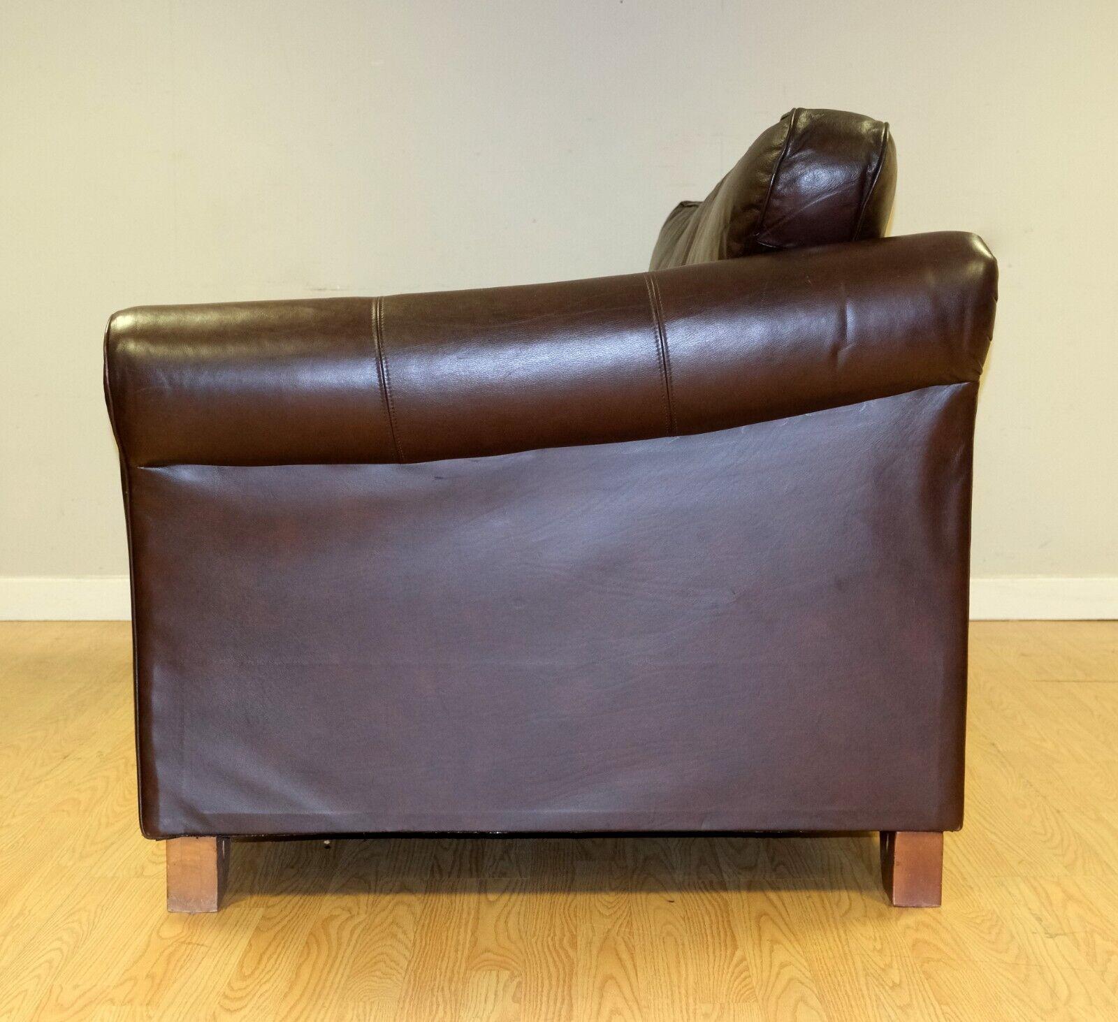 Country Lovely Marks & Spencer Abbey Brown Leather Two Seater Sofa on Wooden Feet For Sale