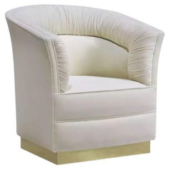 Bella poltrona con base in metallo