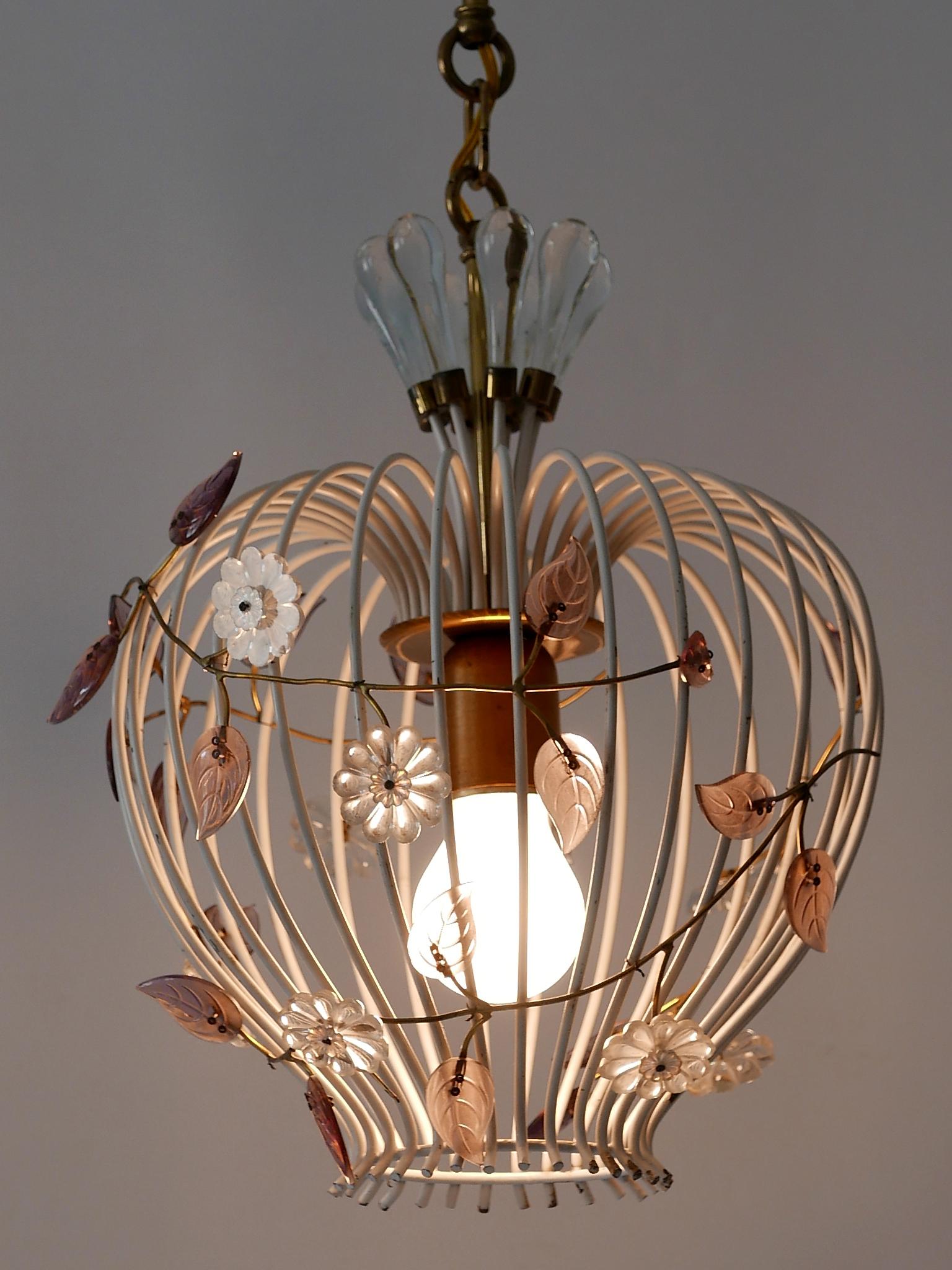 Gorgeous, highly decorative Mid-Century Modern 'Birdcage' pendant lamp or chandelier. Designed & manufactured probably by Vereinigte Werkstätten, Germany, 1950s.

Executed in white color painted metal, brass and glass flowers, the pendant