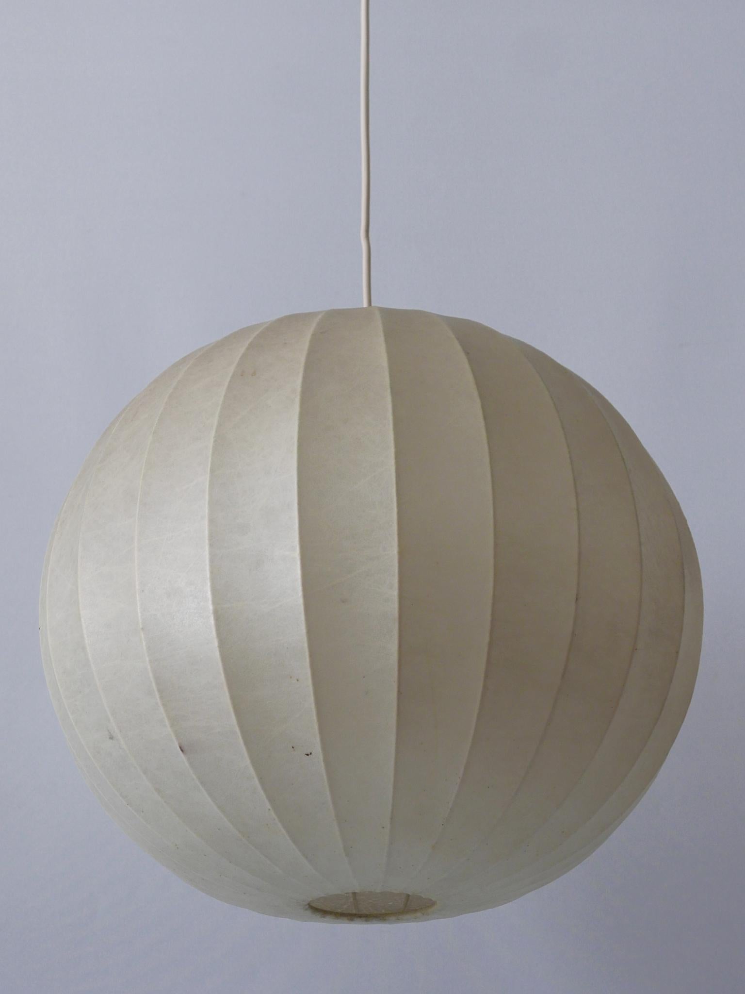 Highly decorative Mid-Century Modern cocoon pendant lamp or hanging light. Designed & manufactured probably by Goldkant, Germany, 1960s.

Executed in sprayed latex material and metal, the pendant lamp needs 1 x E27 / E26 Edison screw fit bulb. It