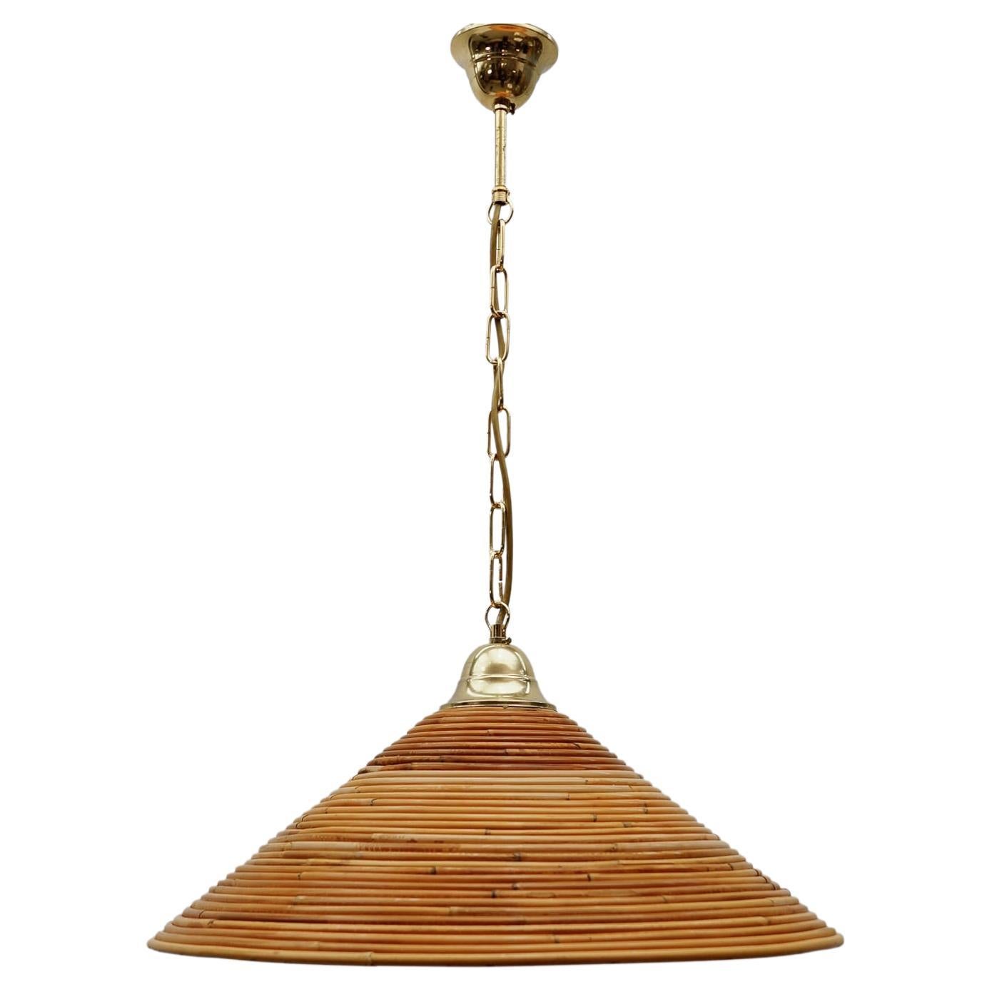 Lovely Mid-Century Modern Pendant Light made in Rattan and Brass , 1950s