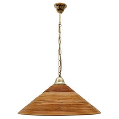 Lovely Mid-Century Modern Pendant Light made in Rattan and Brass , 1950s