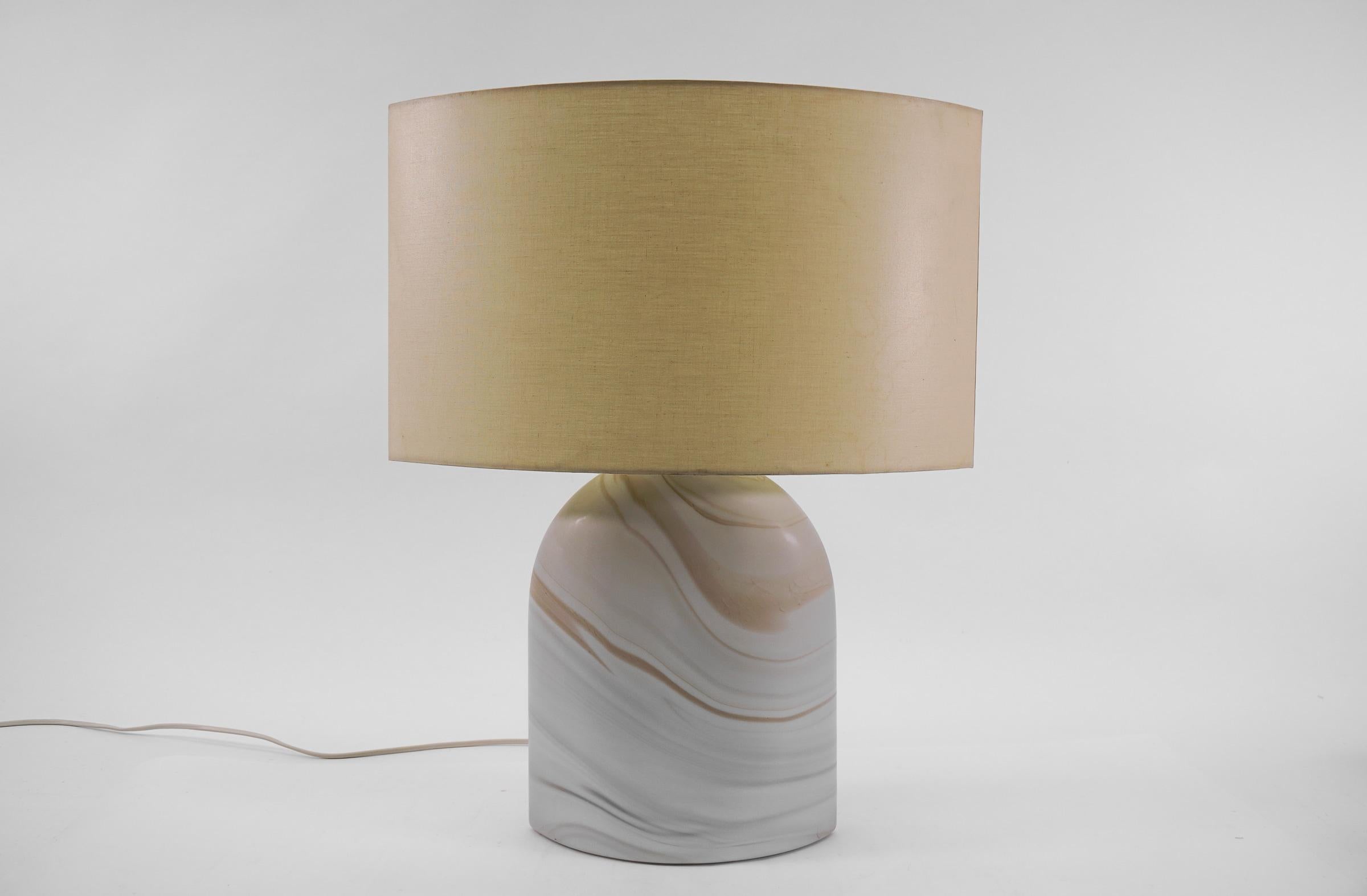 Lovely Mid-Century Modern Table Lamp by Peill & Putzler for Carrara Arte, 1960s Germany.

The lamp needs 1 x E27 Edison screw fit bulb and 1 x E14 inside the glass, is with original wiring, and in working condition. It runs both on 110 / 230