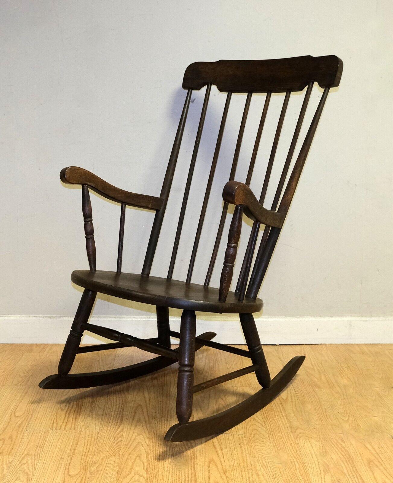 We are delighted to offer for sale this Victorian Windsor Elm slat back rocking chair.

This simple yet classic Windsor rocking chair is presented with a generous seat area and comfortable high back rest. The piece presents a pair of arm rest