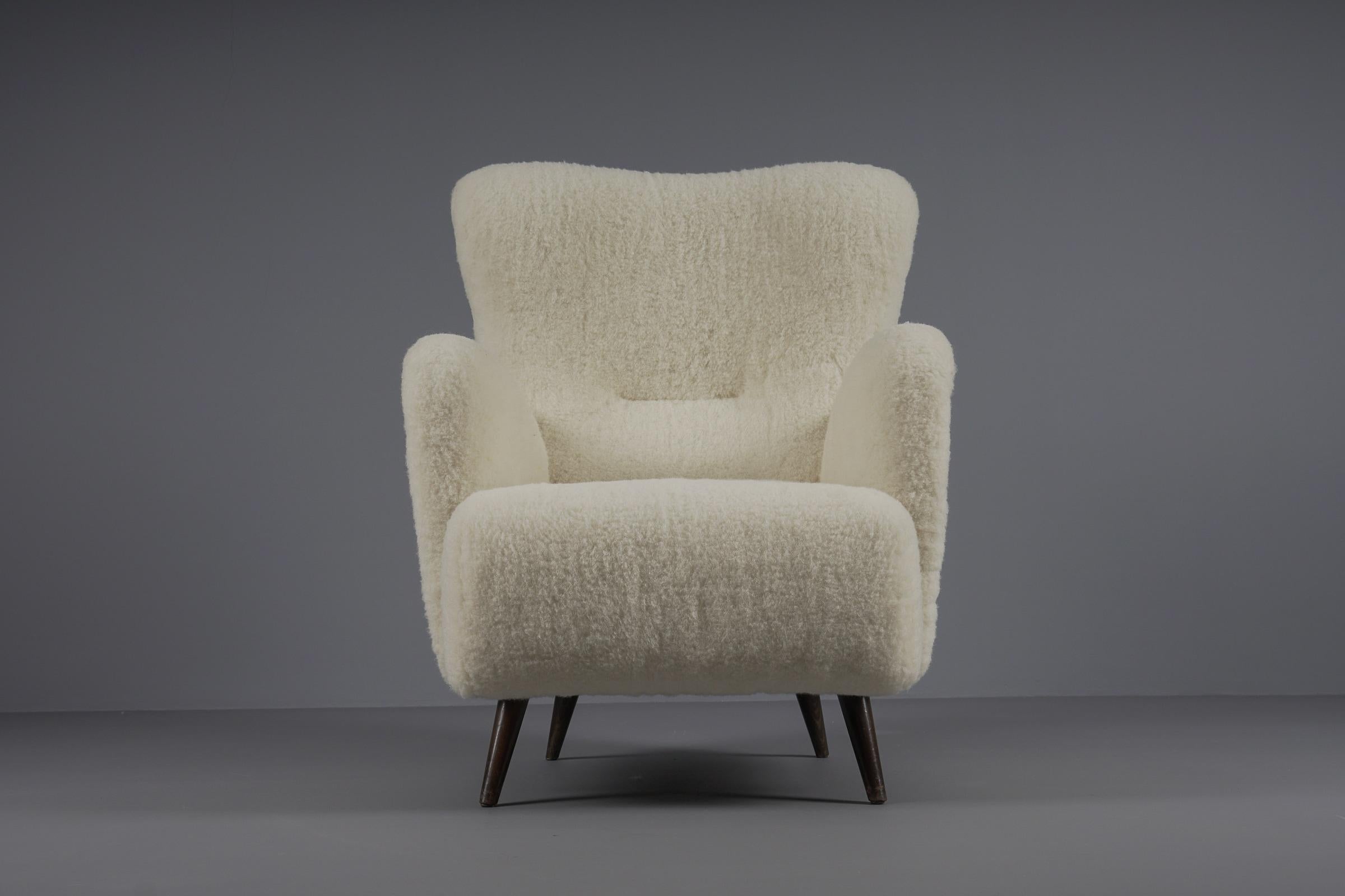Scandinavian Modern Lovely Mid-Century Modern Wingback Chair in sheepskin wool fabric, 1950s 