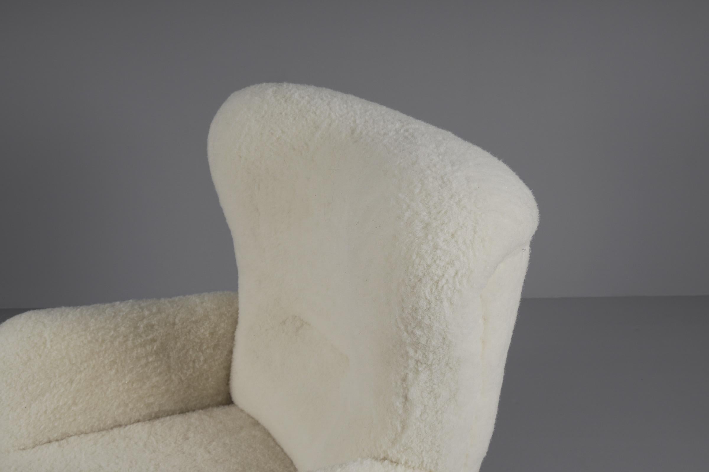 Mid-20th Century Lovely Mid-Century Modern Wingback Chair in sheepskin wool fabric, 1950s 