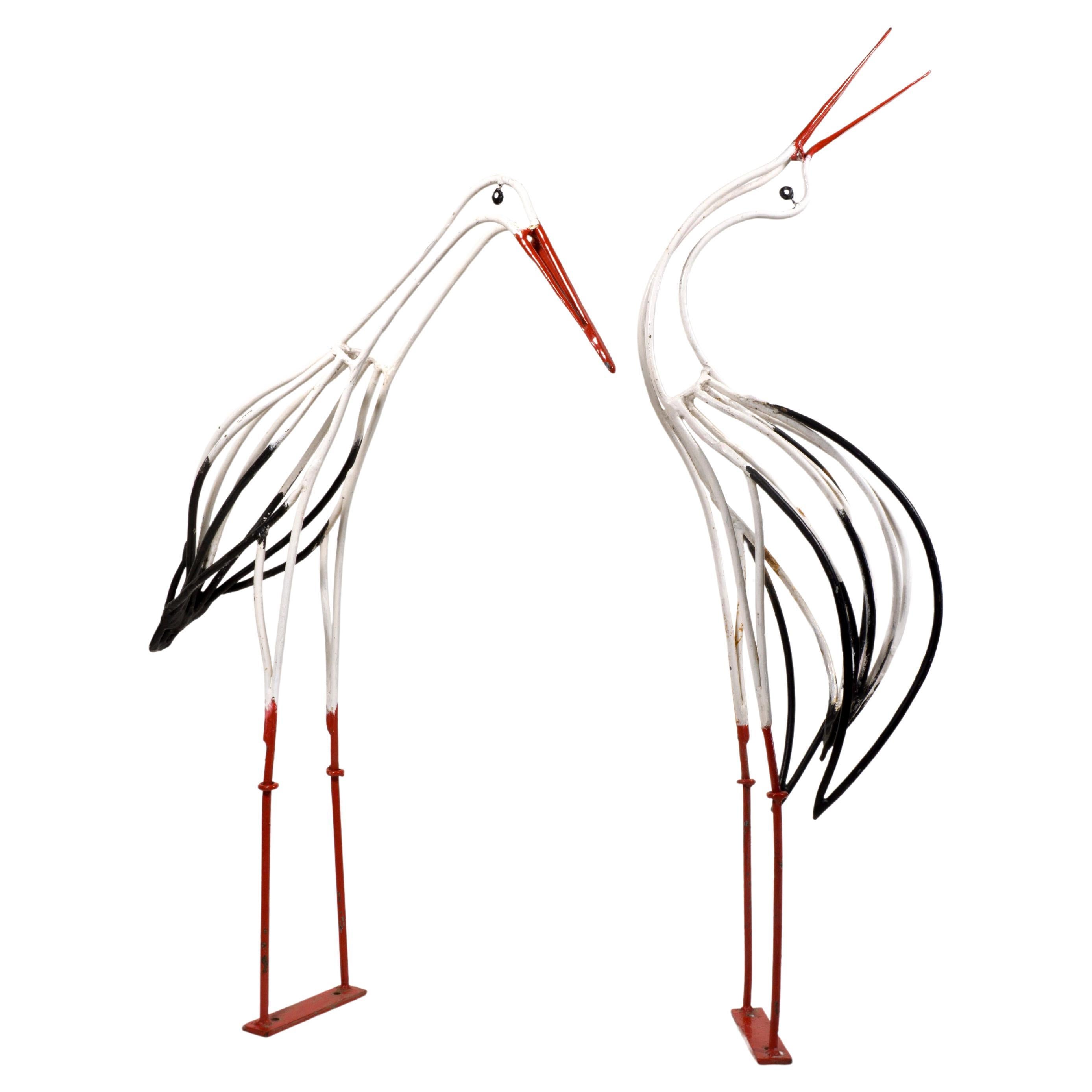 Very decorative and utterly attractive life-size pair of laquered wrought iron stork sculptures from the 1950s.
Each Stork is well finished and both of them have a lovely naturally weathered and aged patina, so the sculptures are in good vintage
