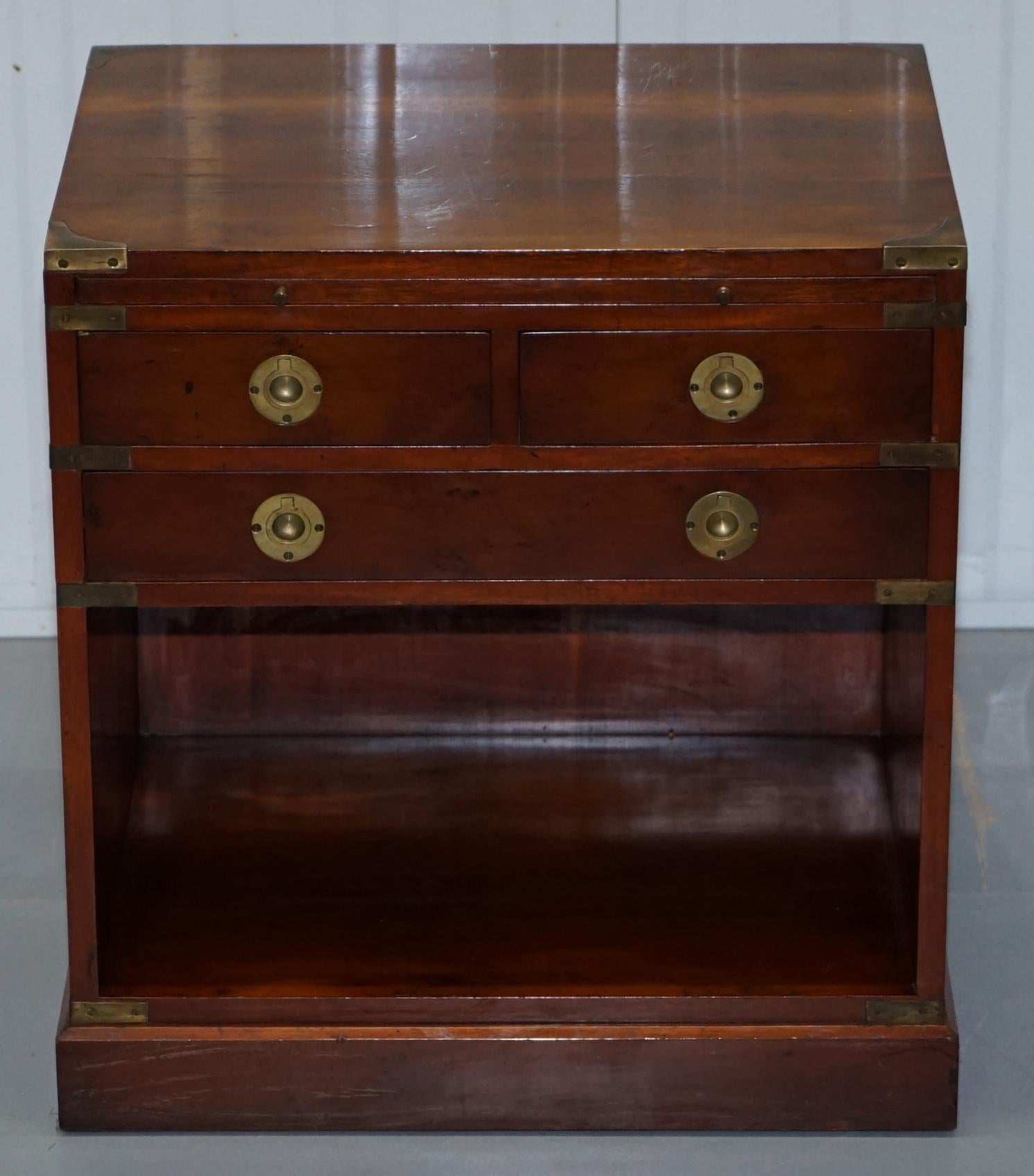 We are delighted to offer for sale this lovely Vintage handmade in England Burr Yew wood chest of drawers in the Military campaign manor with green leather butlers serving tray

Please note the delivery fee listed is just a guide, it covers within