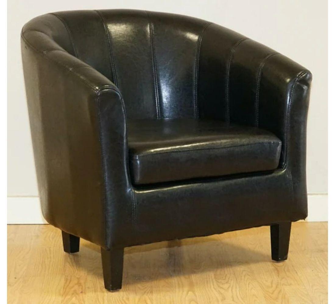 We are delighted to offer for sale this lovely black faux leather tub chair.

A great chair to add to your office, workspace, kids' bedroom or anywhere you know it will be well used.

Faux leather is fantastic for durability, and it is a