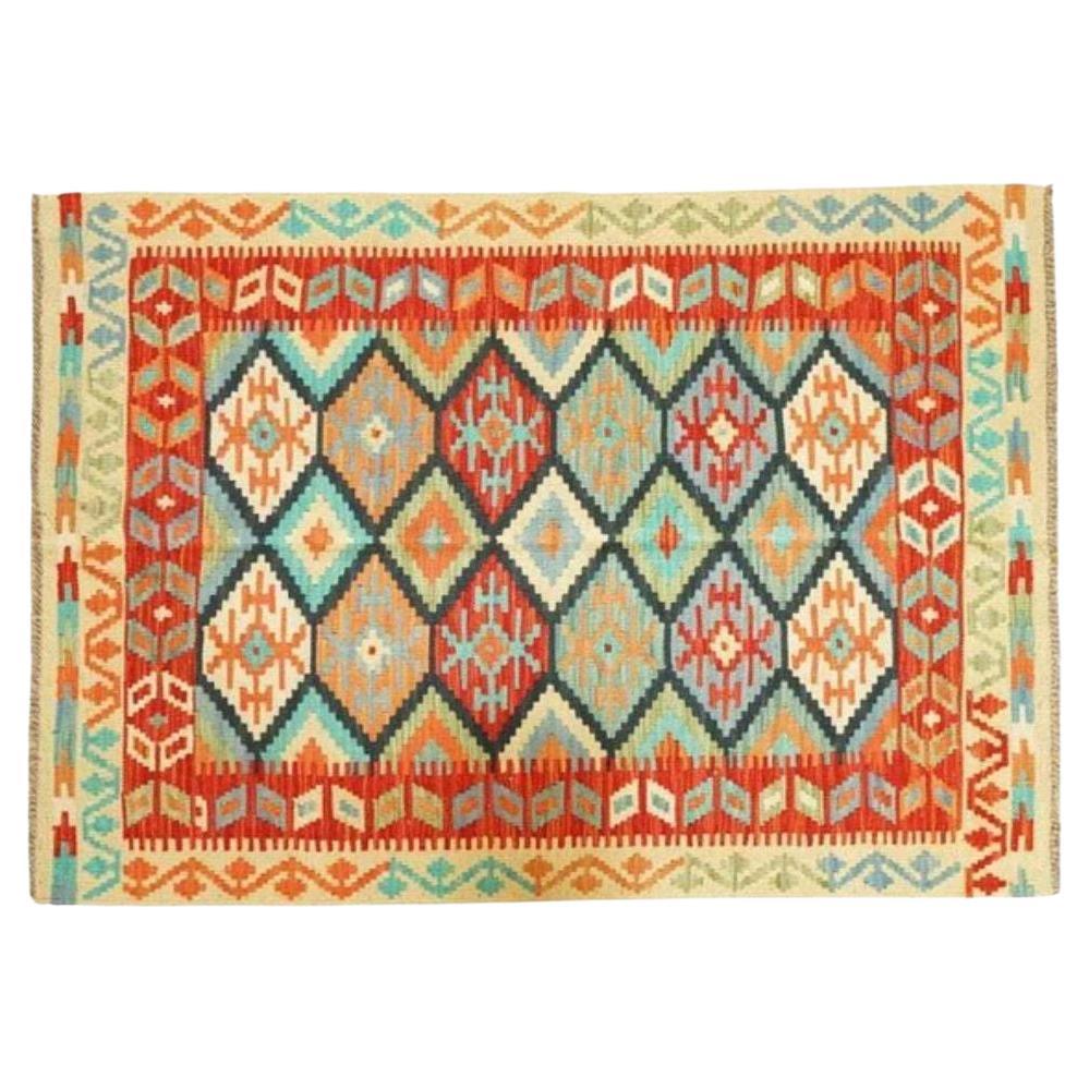 Ravissant tapis Kilim Aztec géométrique multicolore vintage