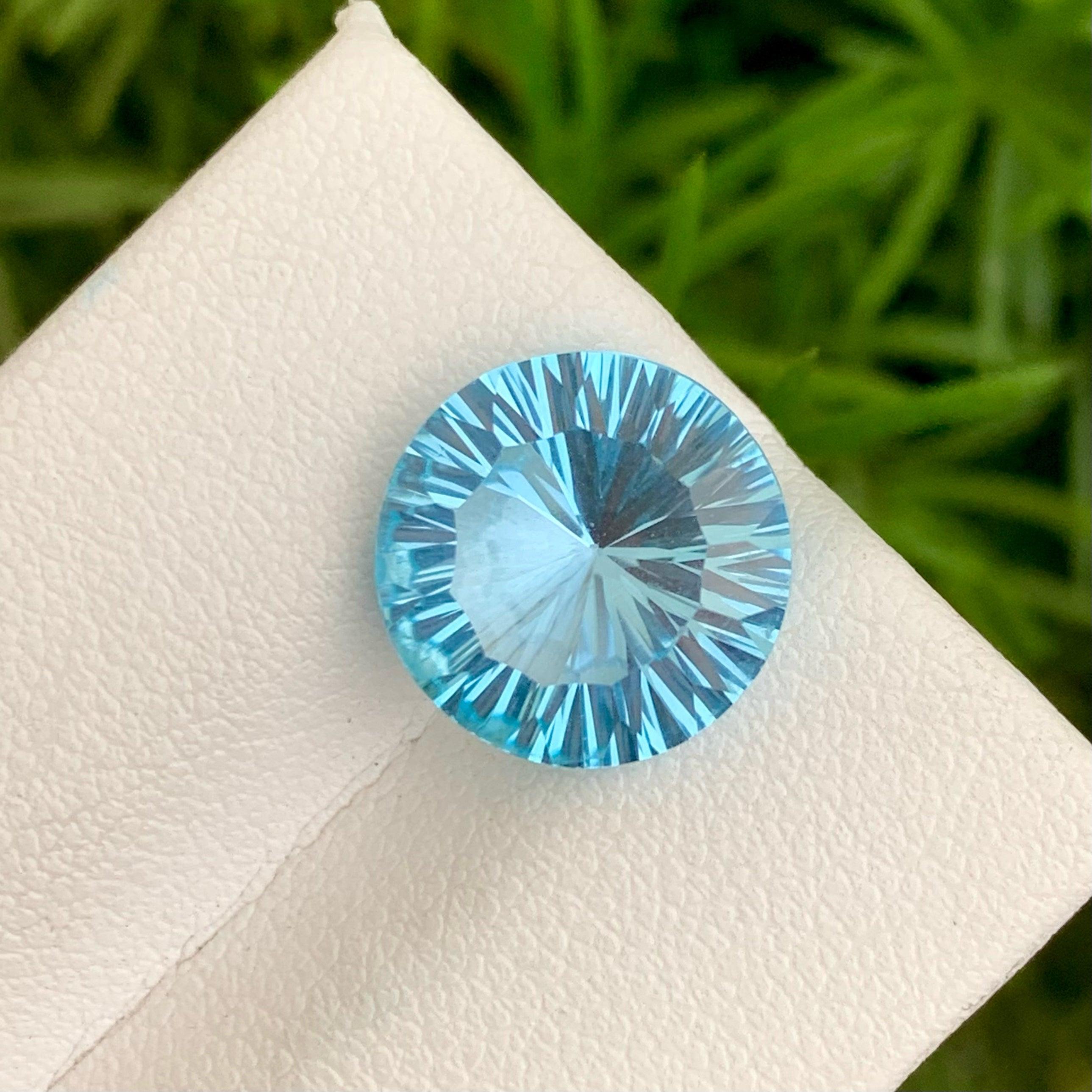 Lovely Natural Carved Swiss Blue Topaz Stone, available For Sale At Wholesale Price Natural High Quality 6.55 Carats eye clean Clarity Natural Loose Topaz From Madagascar. 

Product Information:
GEMSTONE NAME: Lovely Natural Carved Swiss Blue Topaz