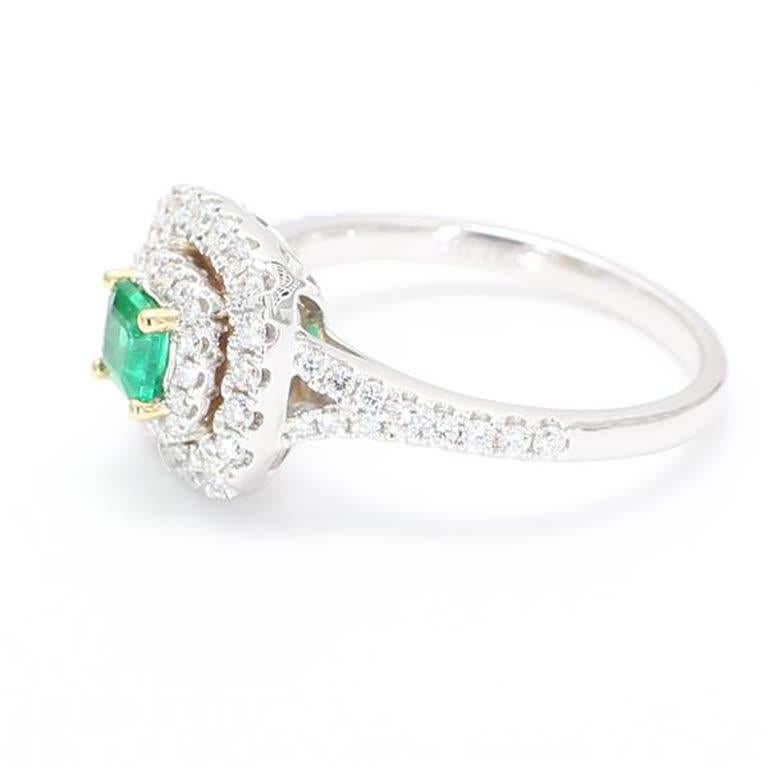 Contemporary Natural Emerald Cut Emerald and White Diamond .74 Carat TW Gold Cocktail Ring