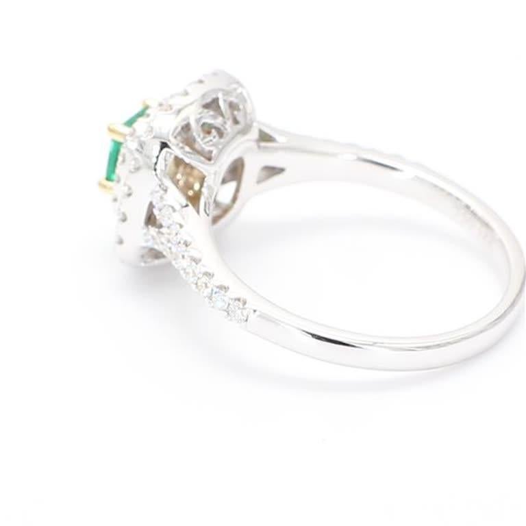 Natural Emerald Cut Emerald and White Diamond .74 Carat TW Gold Cocktail Ring In New Condition In New York, NY