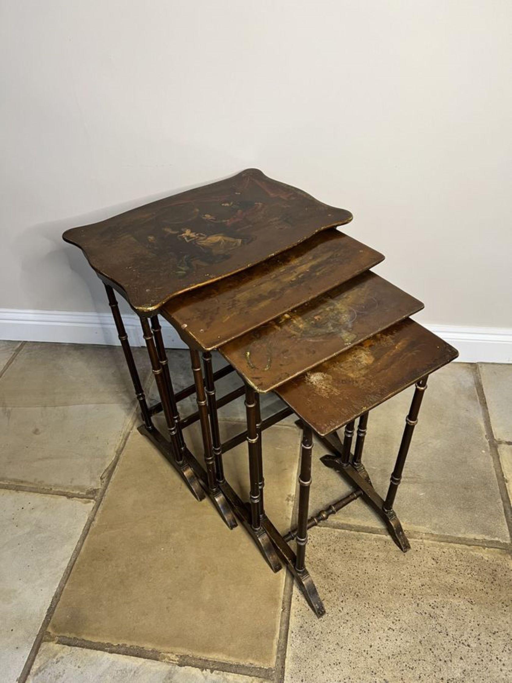 Lovely nest of four antique Edwardian quality decorated tables, having the original hand painted decorated tops, supported by turned columns, standing on shaped feet united by turned stretchers.

D. 1900