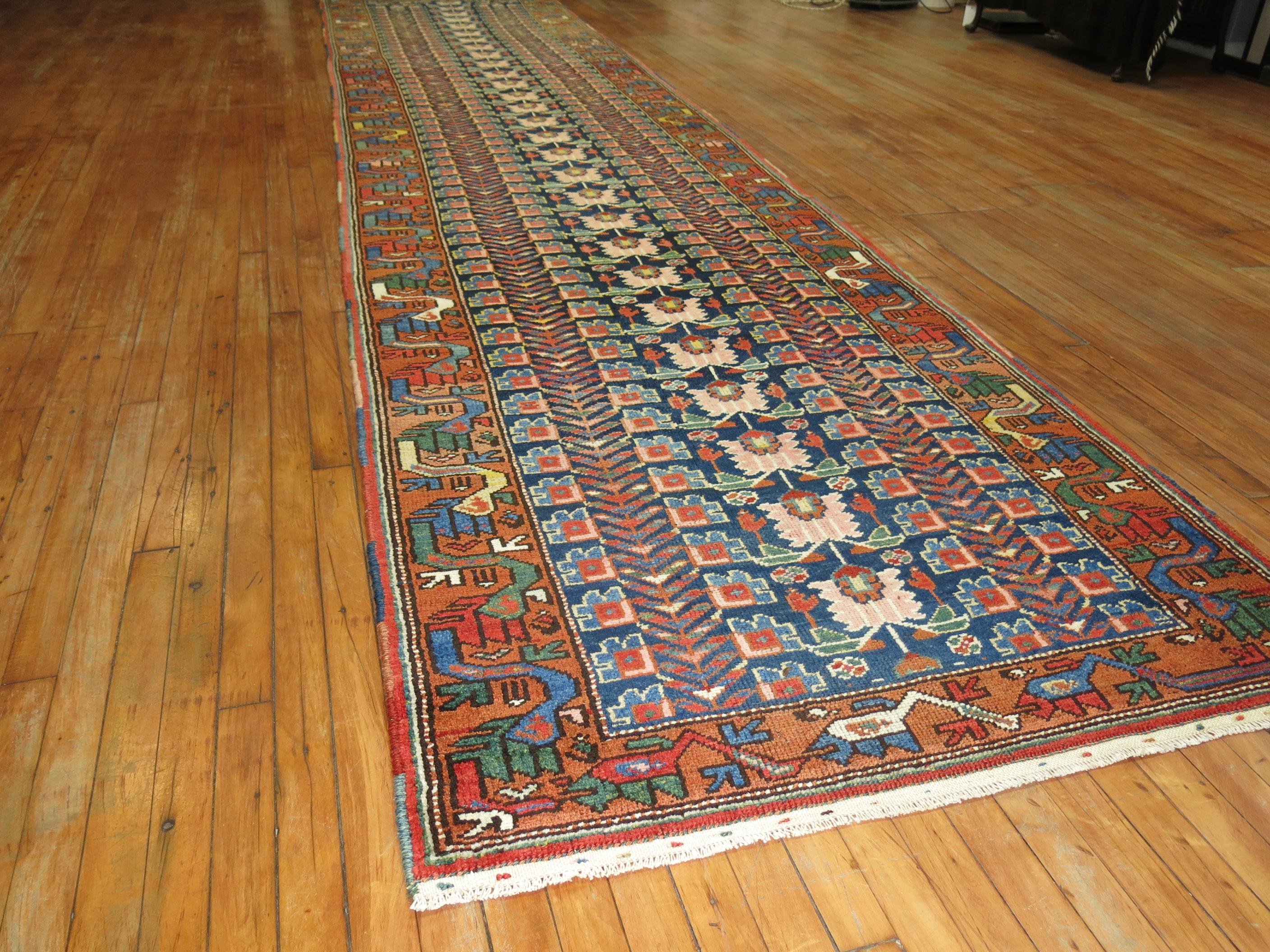 An antique Northwest Persian eclectic pattern rug from the early 20th century.

Measures: 3'10'' x 17'8''.


 