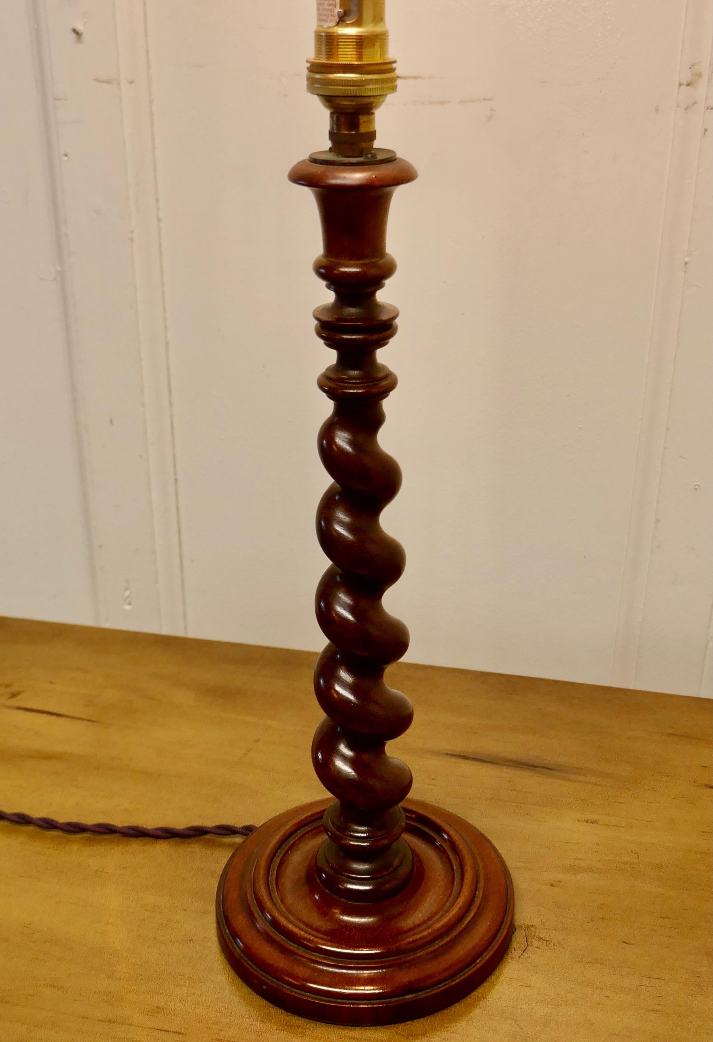 Lovely oak turned barley twist table lamp

 A skilfully turned piece of oak, this lamp stands on a turned wooden base, it is in good condition, the wiring is working and seems to be new.
The lamp is 16” high and the base is 6” in diameter.
GB715.
