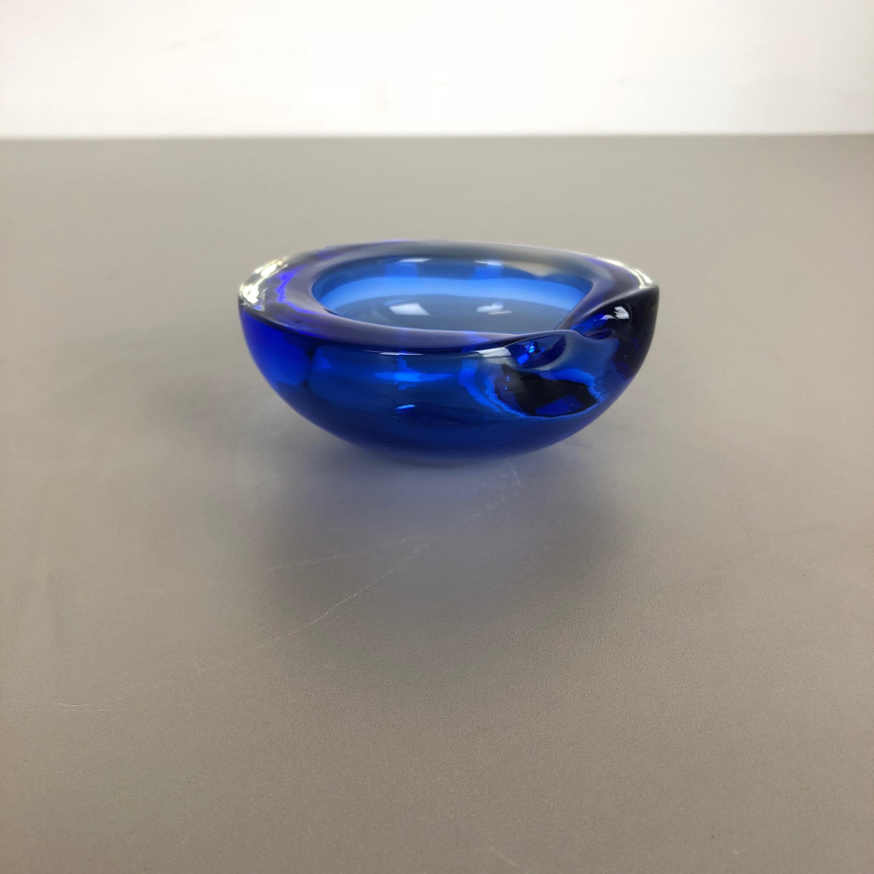 Article:

Murano glass bowl, ashtray element


Origin:

Murano, Italy


Decade:

1970s



This original vintage glass bowl element, ashtray was produced in the 1970s in Murano, Italy. It is made in Murano technique and has an organic