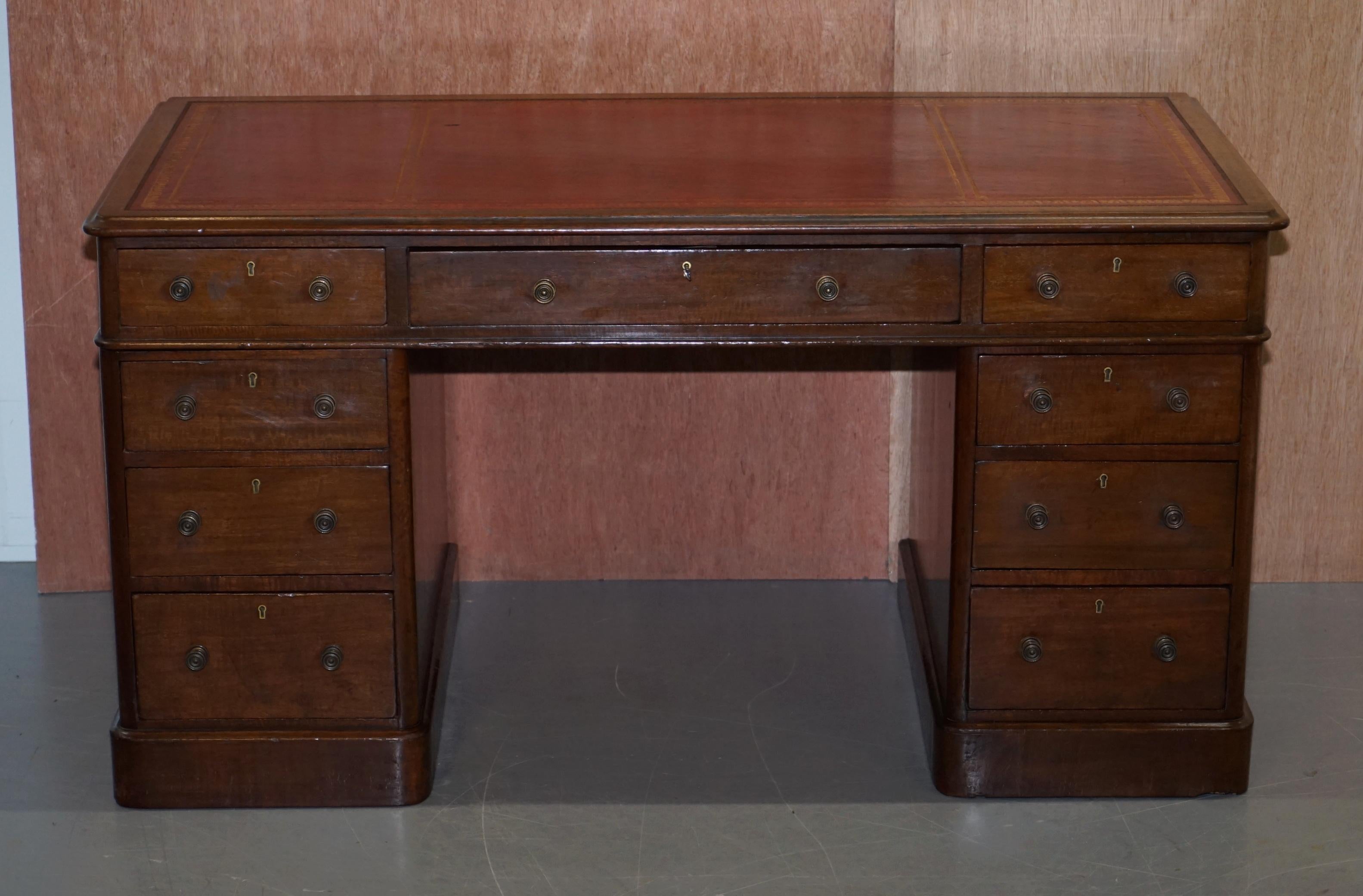 We are delighted to offer this original Victorian circa 1880 light mahogany twin pedestal partner desk with oxblood leather writing surface

A very good looking well made traditional antique desk. The handles are a design popular from the late