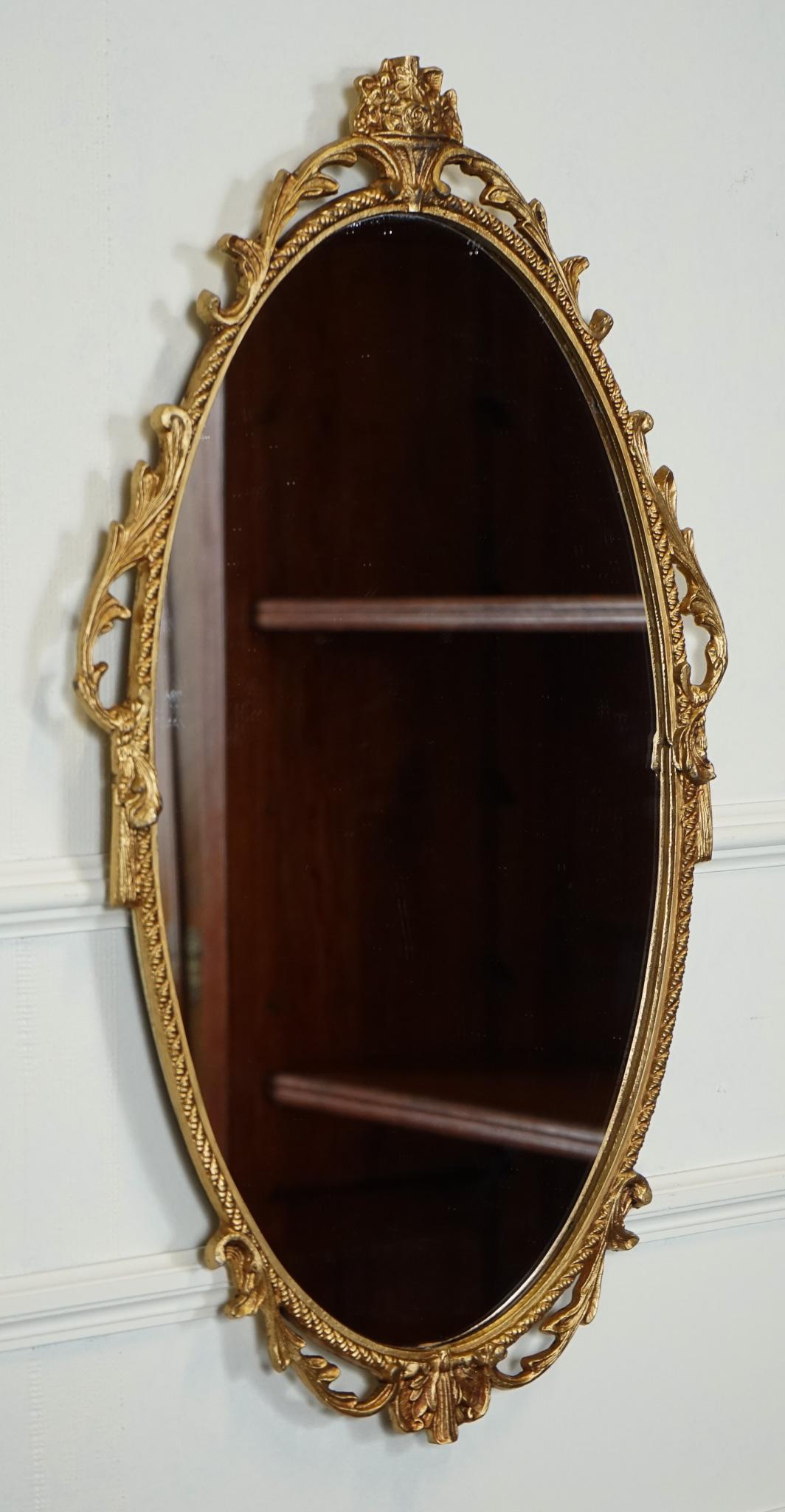 

We are delighted to offer for sale this Gold Ornate Oval Mirror.

Please carefully examine the pictures to see the condition before purchasing, as they form part of the description. If you have any questions, please message us.