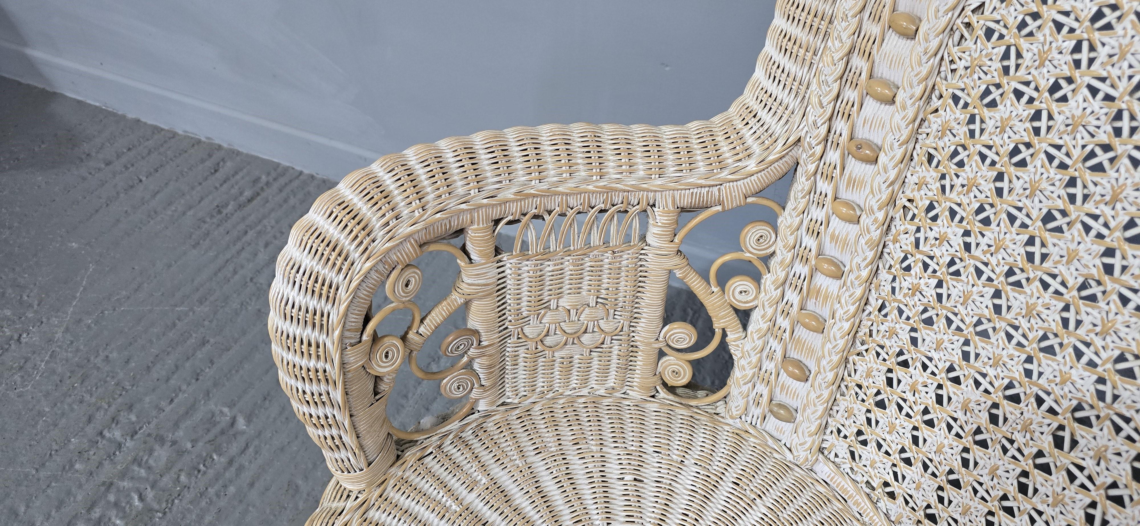 British Colonial Lovely Painted Wicker Peacock Chair For Sale