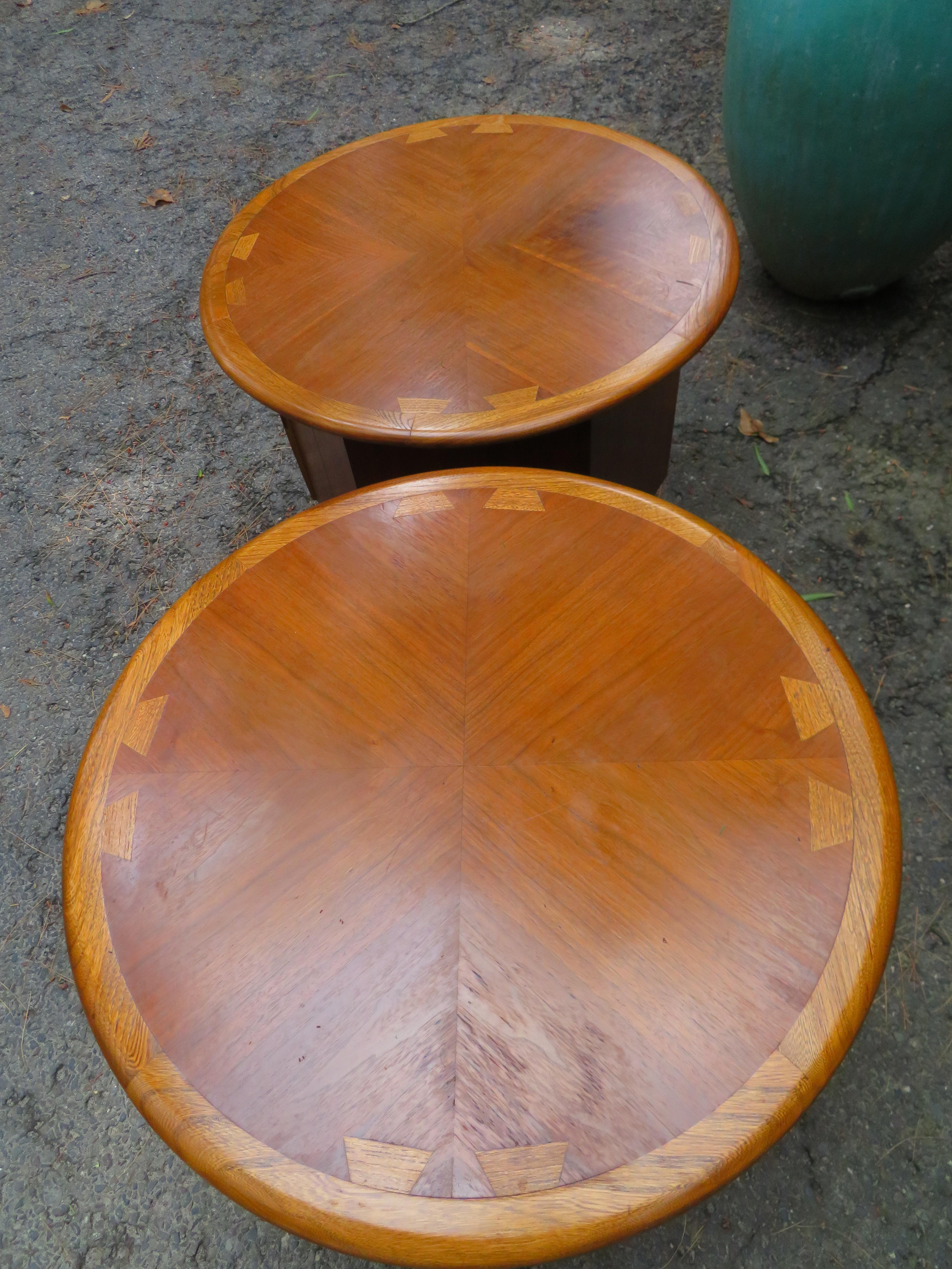 Lovely pair of Lane Acclaim walnut drum end tables. Tables have two doors that open underneath and reveal a nice open space. Designed by Andre Bus for the Lane Acclaim collection, these wonderfully functional tables are definitely one of our