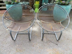 Lovely Pair of Maurizio Tempestini for Salterini Circular Radar Saucer Chairs