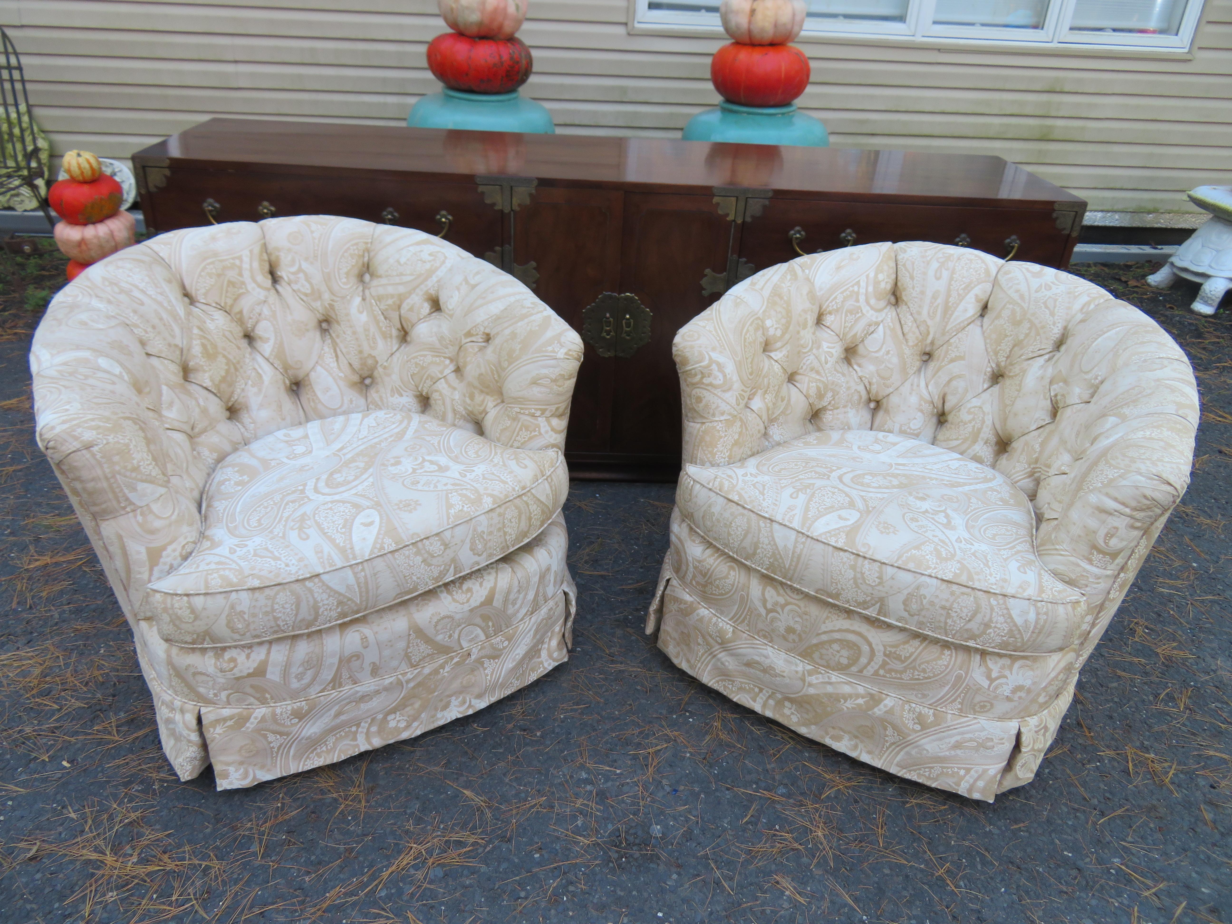 Lovely pair of tufted barrel back swivel rockers in the style of Milo Baughman. These chairs are incredibly comfortable being swivel rockers. They measure 28