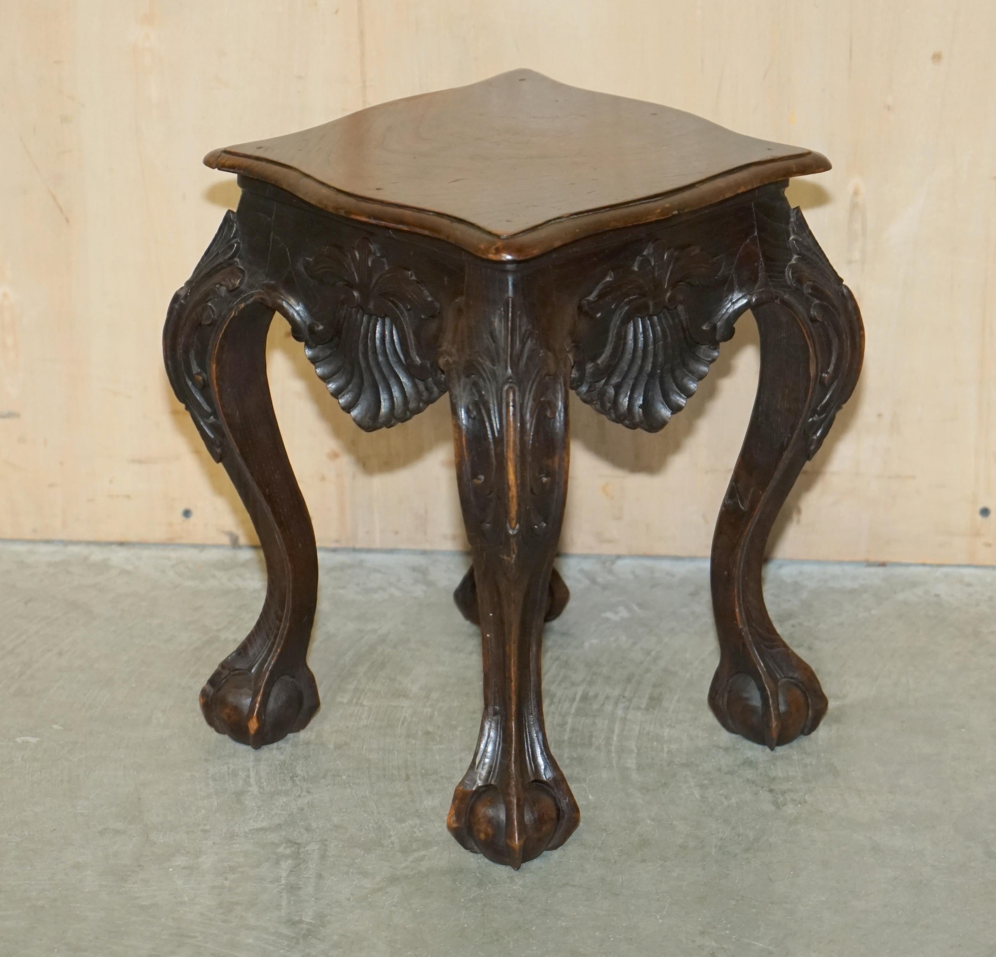 We are delighted to offer for sale this sublime pair of antique 19th century heavily carved Claw & Ball feet side tables in Mahogany.

These are a very well made and decorative pair, ideally suited for plants, lamps and to be used as side tables,