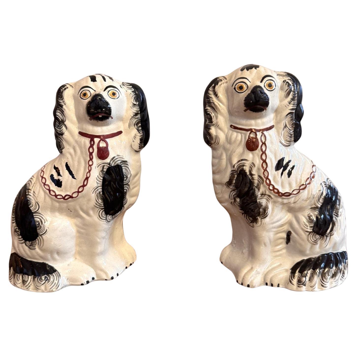 Lovely pair of antique Victorian Staffordshire dogs