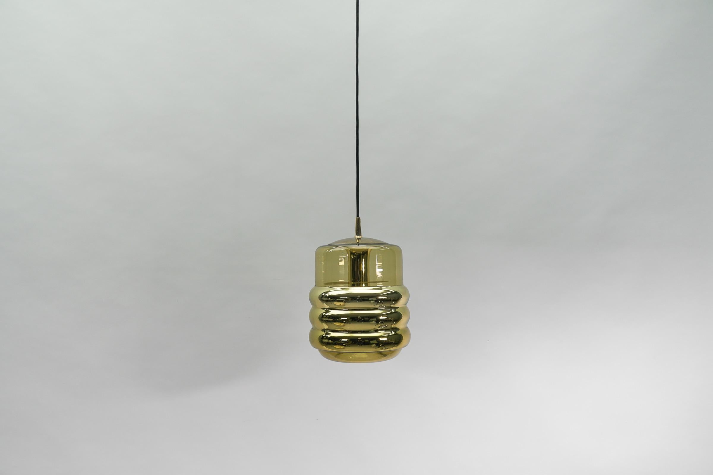Vintage German pendant lamps in glass by Limburg. E27 socket. 

Fully functional. 

Each lamp comes with an E27 socket. Works with 220V and 110V.

Wiring is suitable for all countries.