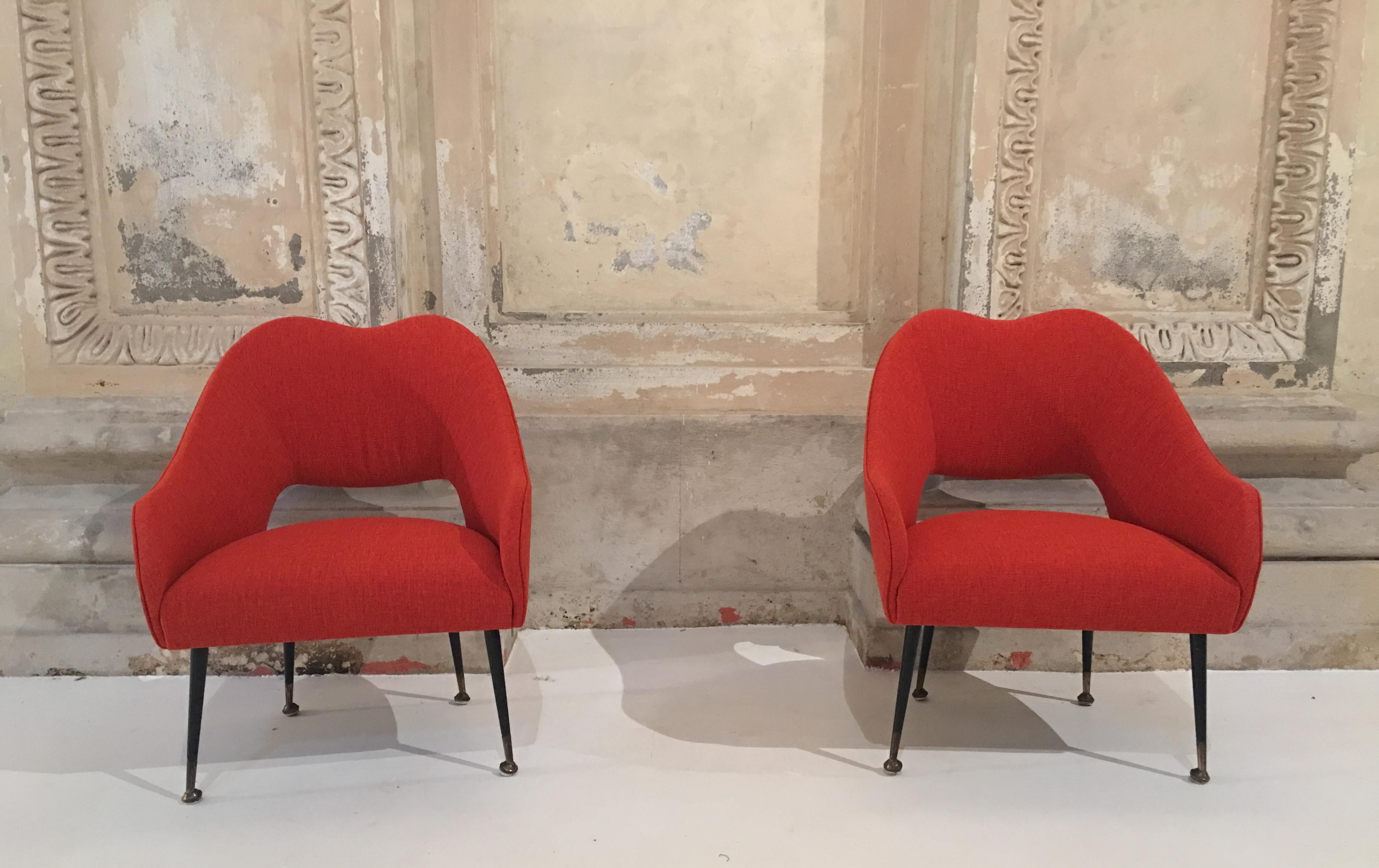 Charming chairs with black metal legs with brass sabots.
Newly reupholstered with red fabric.
 
