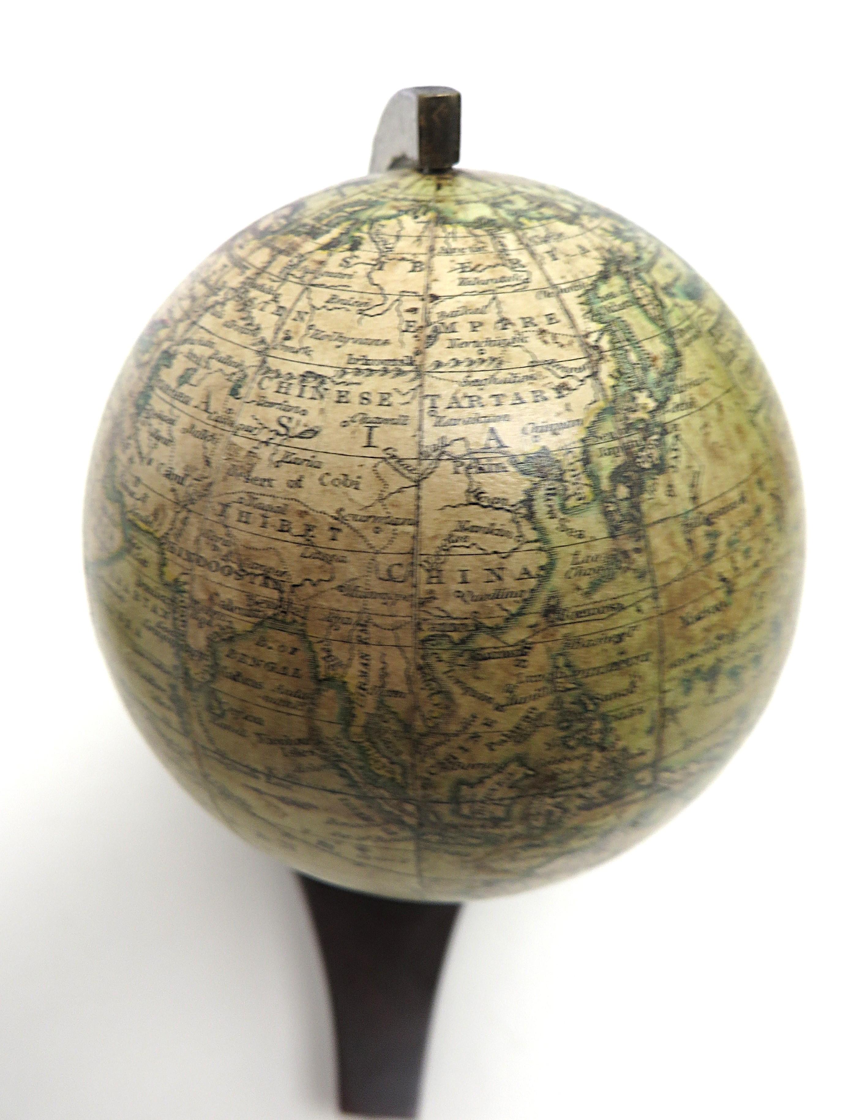 British Lovely pair of English miniature globes on carved wooden stands For Sale