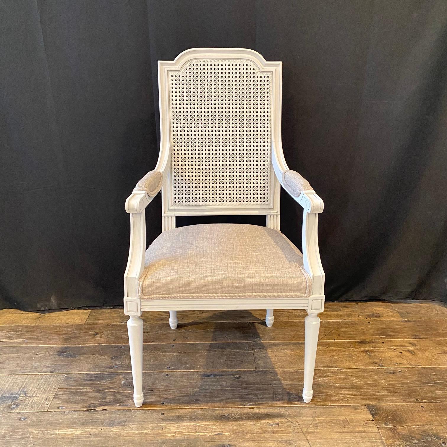 Really lovely Louis XVI armchairs bought in Lyon, France. Sturdy with caning, all in great condition. New upholstery. 
#5866

Measure: H arm 27”.