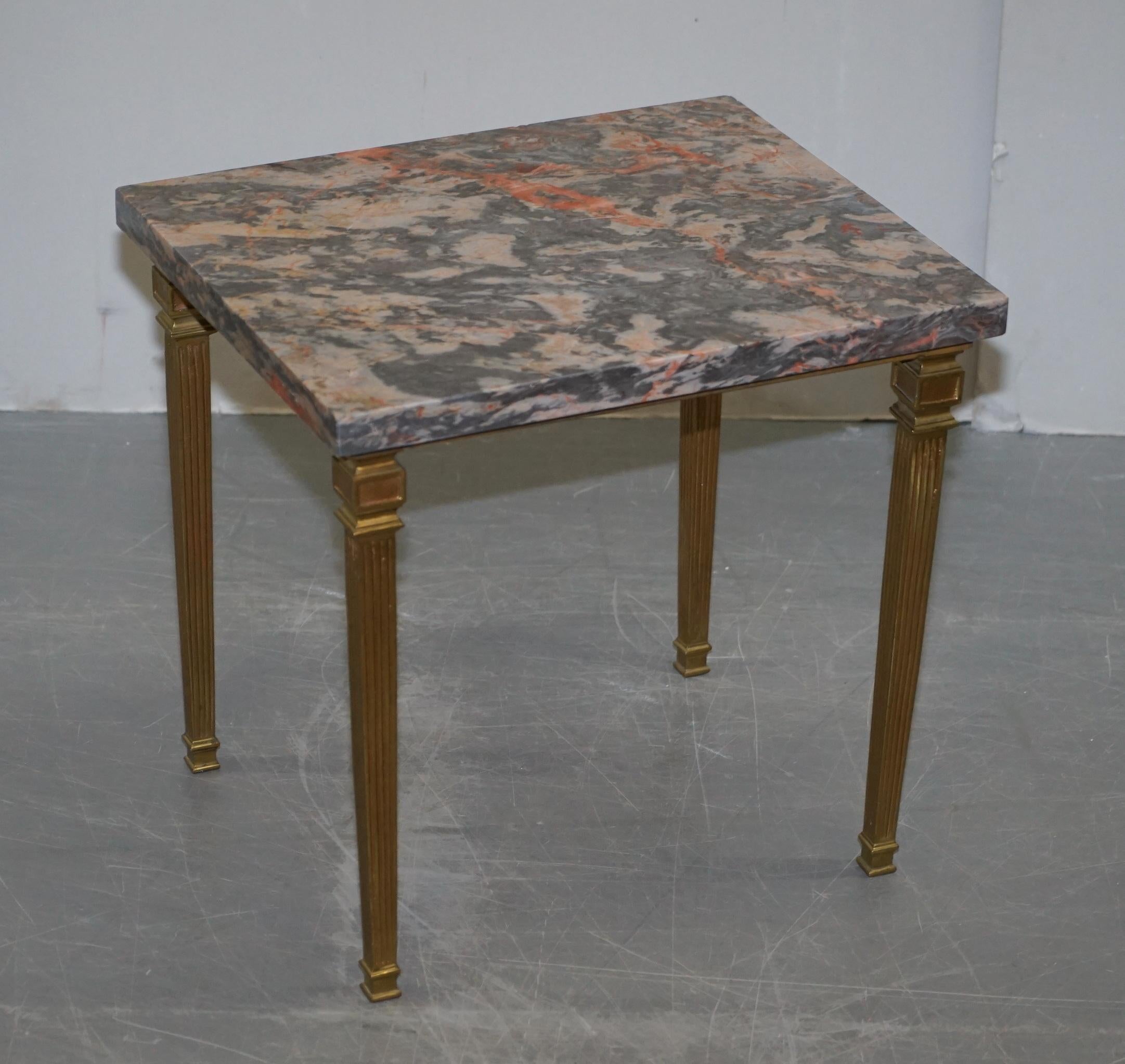 We are delighted to offer for sale this lovely pair of vintage gold gilt bronze side tables with thick heavy marble tops

A very good looking and decorative pair of side tables. The marble tops are very very thick and extremely heavy. The gilt