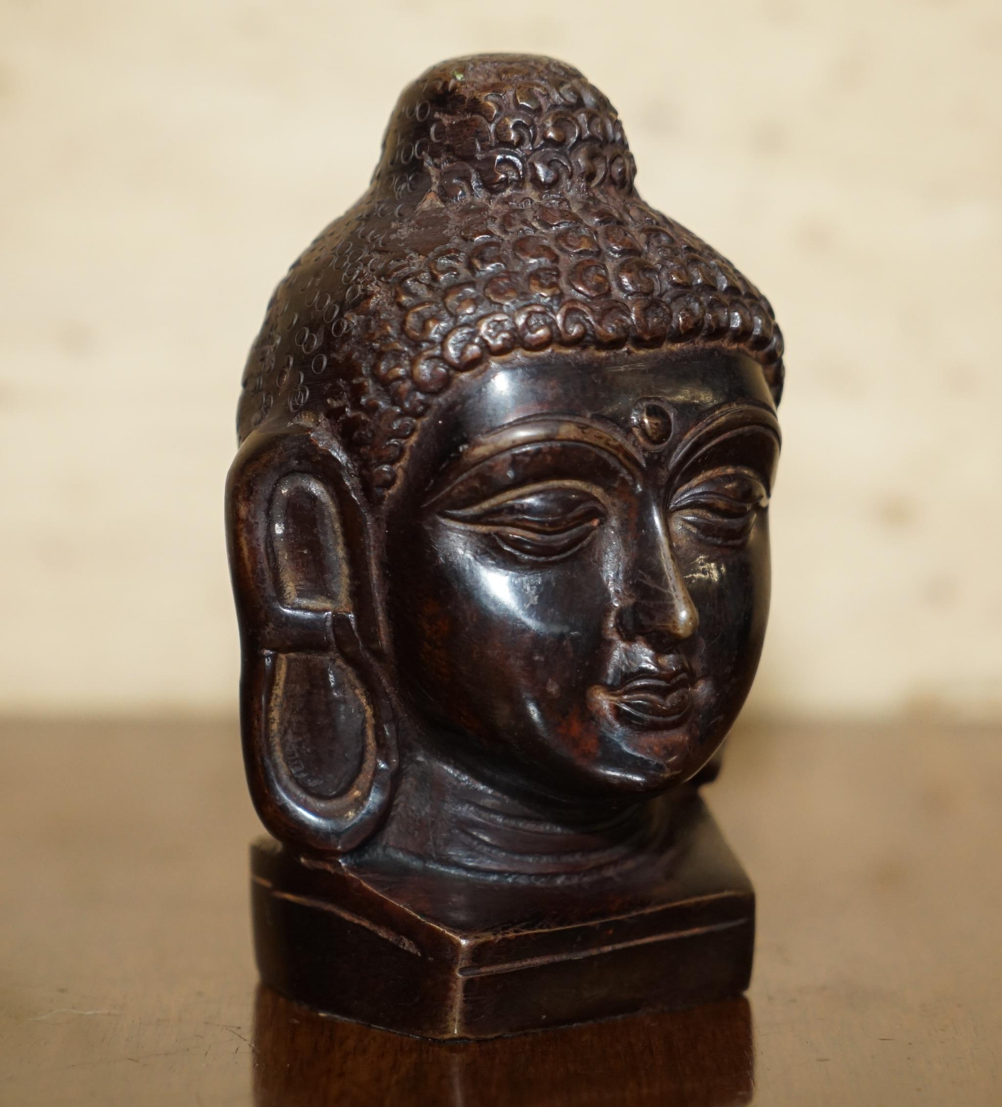 We are delighted to offer for sale this lovely pair of bronzed Indonesian Buddha head statues

A very nicely cast pair, we have owned them for around 20 years and they weren’t new when we bought them, I’m not sure of the exact age but they have a