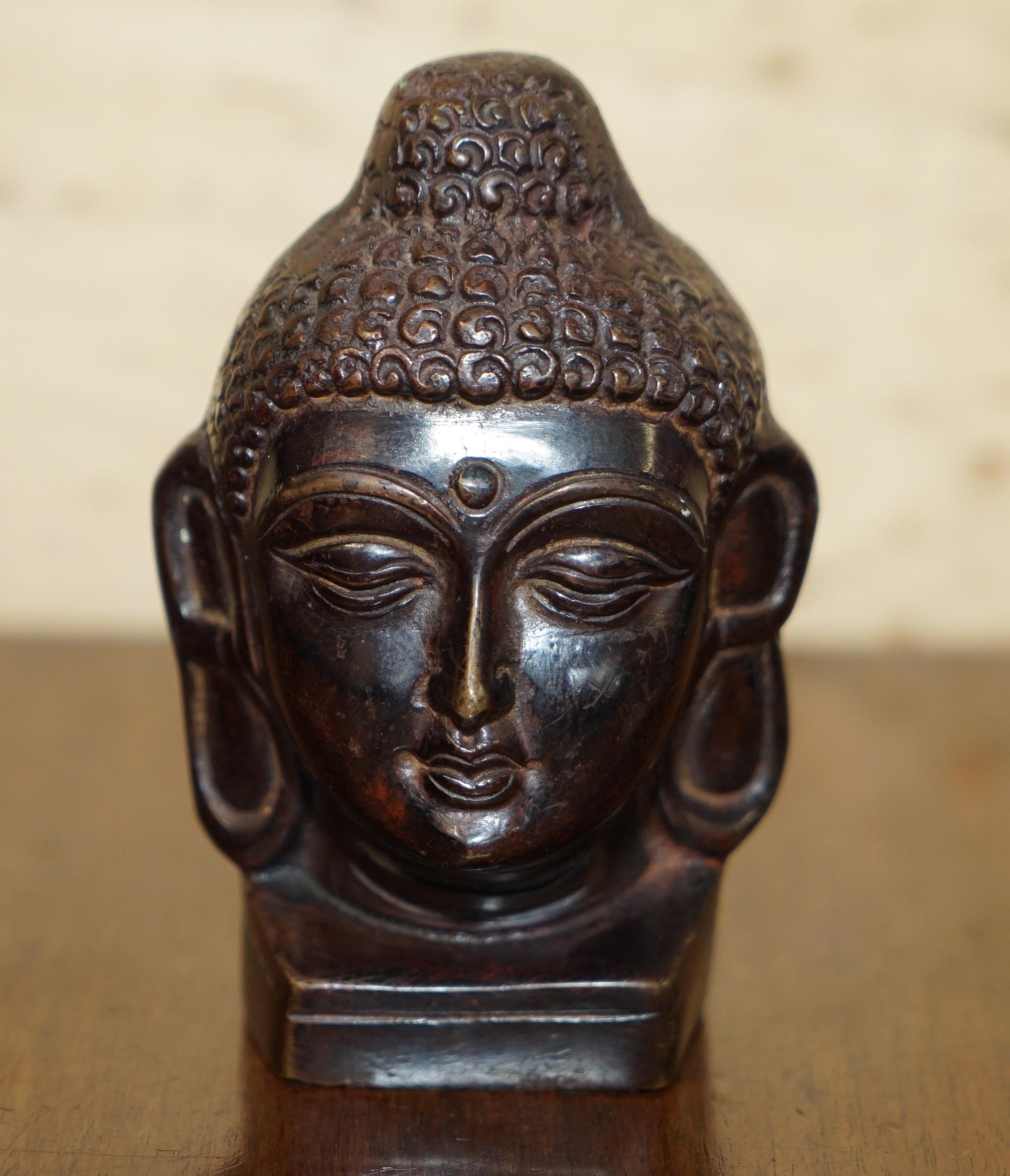 Anglo-Indian Lovely Pair of Indonesian Bronzed Buddha Heads Very Decorative Lovely Patina For Sale