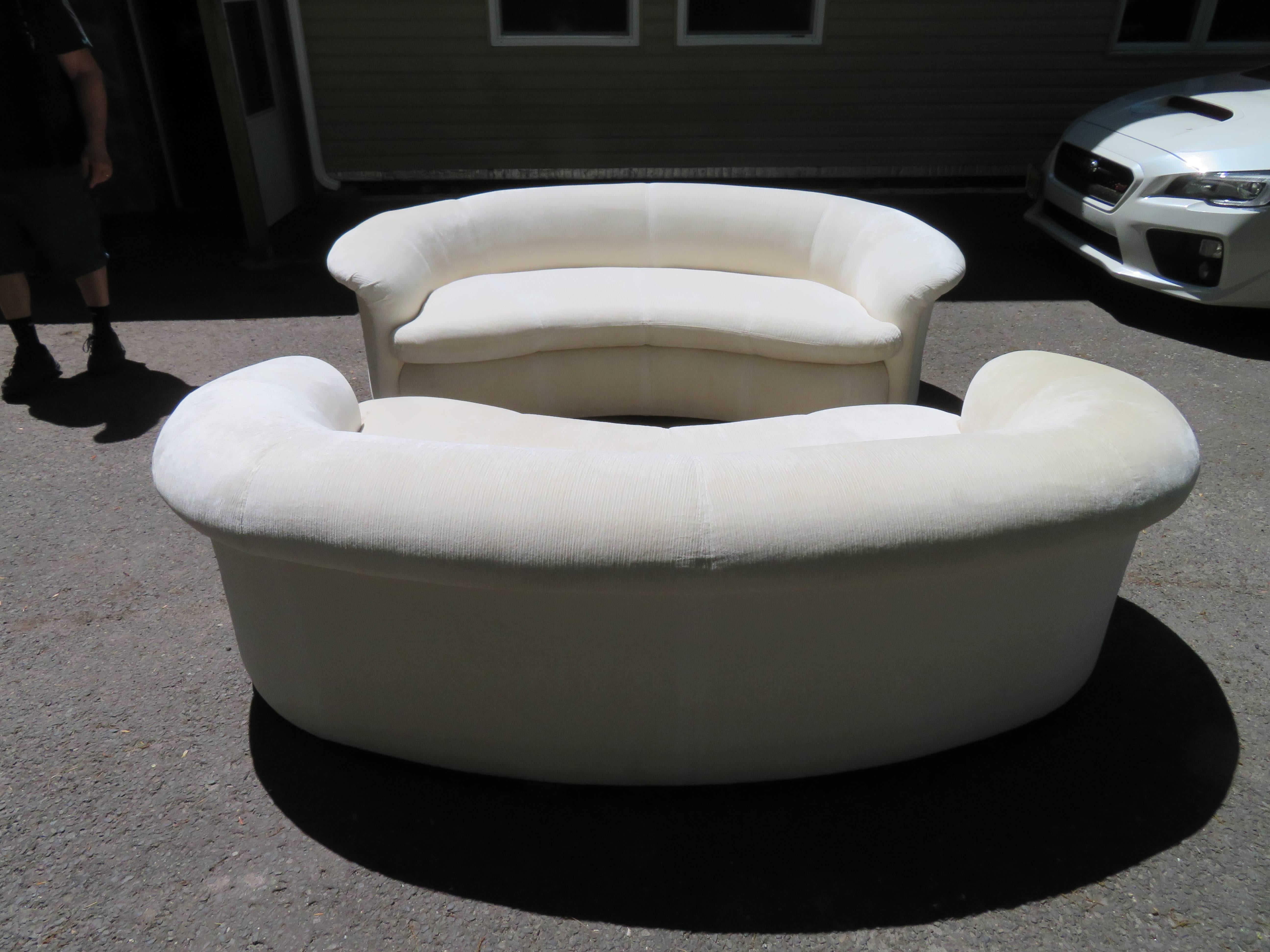 Lovely pair of curved kidney shaped sofas for Weiman-Vladimir Kagan style. This pair are the perfect size at 28