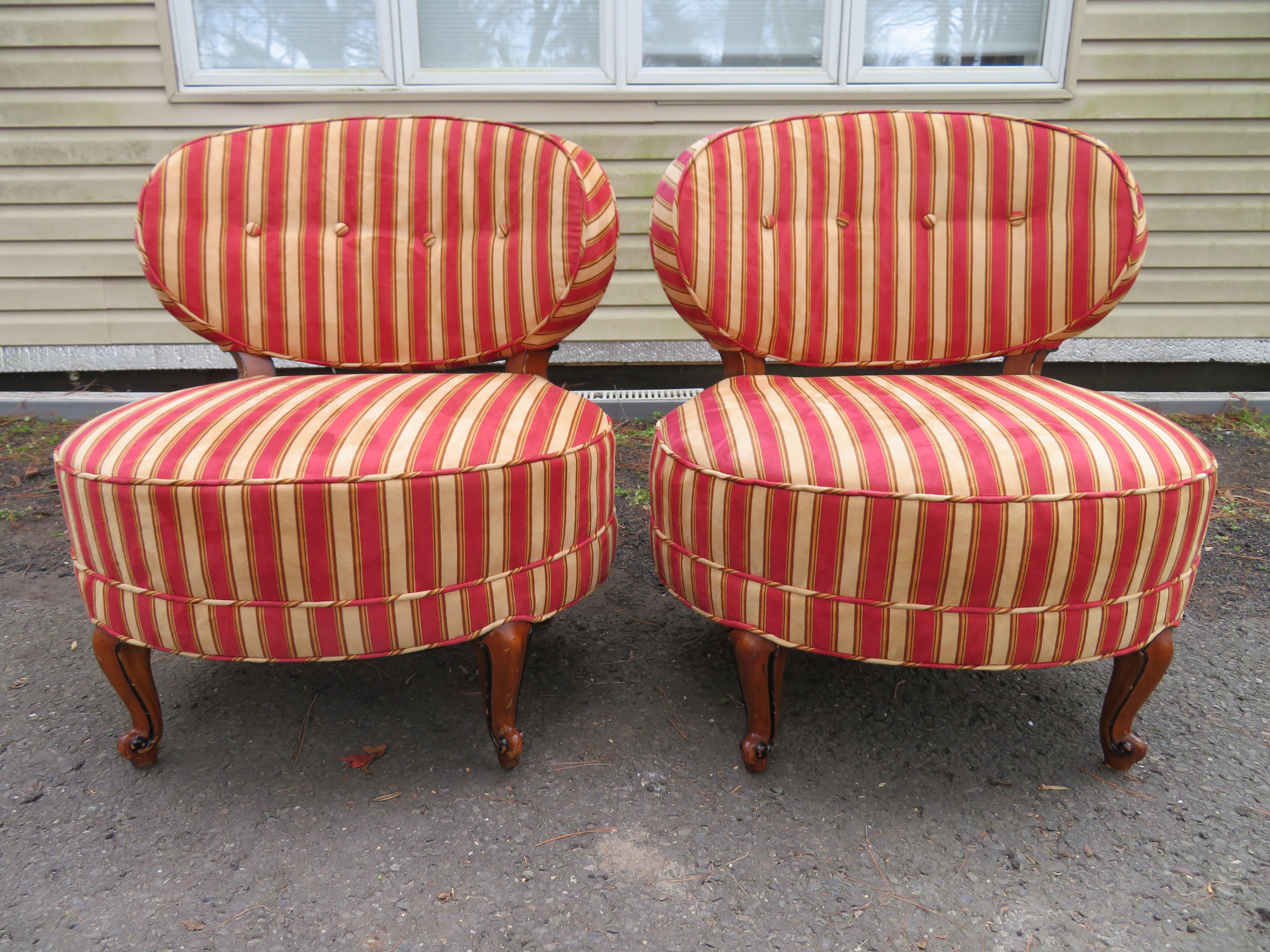 Lovely pair of Napoleon Billy Haines style slipper chairs. These chairs have wonderful wide oval seats and generous curved backs. Also check out the well carved stout cabriole legs all around-very stylish! They were re-upholstered within the last 10