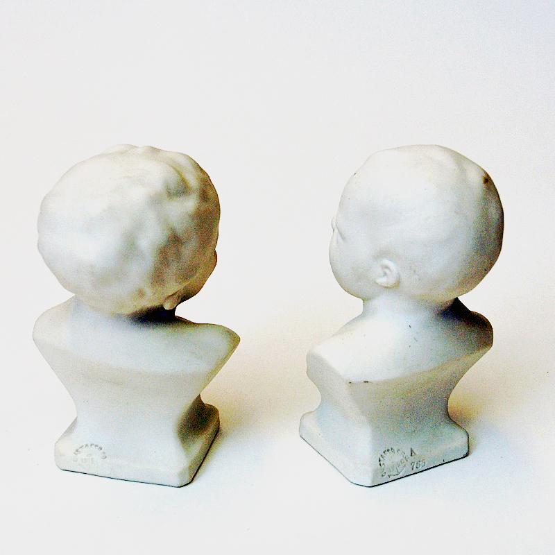 porcelain child figurines