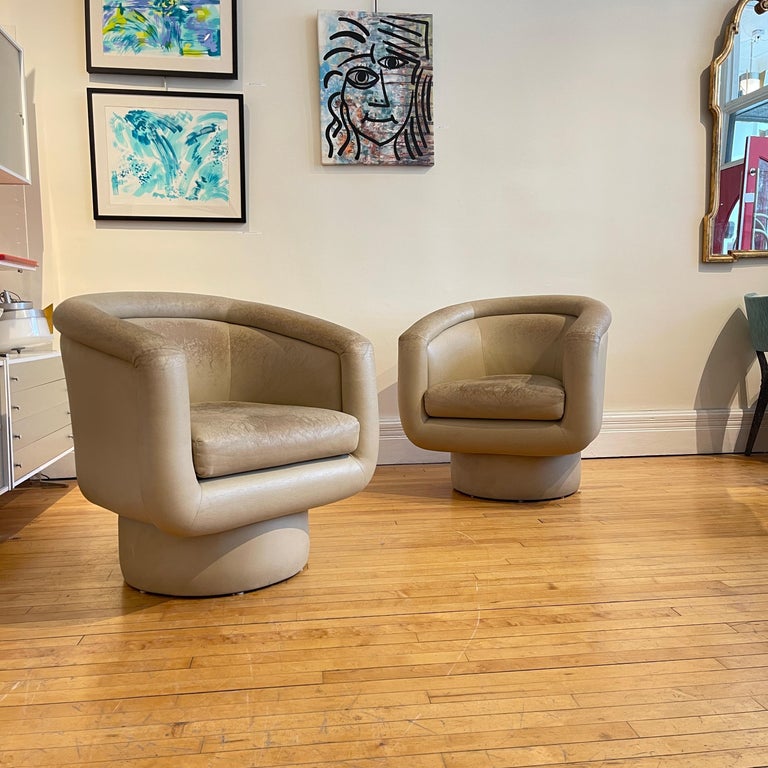 American Lovely Pair of Post-Modern Sculptural Patinated Swivel Chairs For Sale