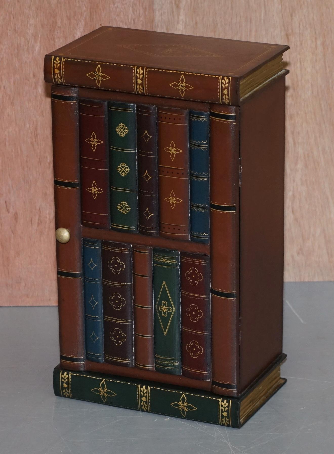 We are delighted to offer for sale this lovely pair of small vintage faux book library or study small side tables

A good looking and well made pair, the faux book style dates back to the early Victorian era and was a great way to hide precious