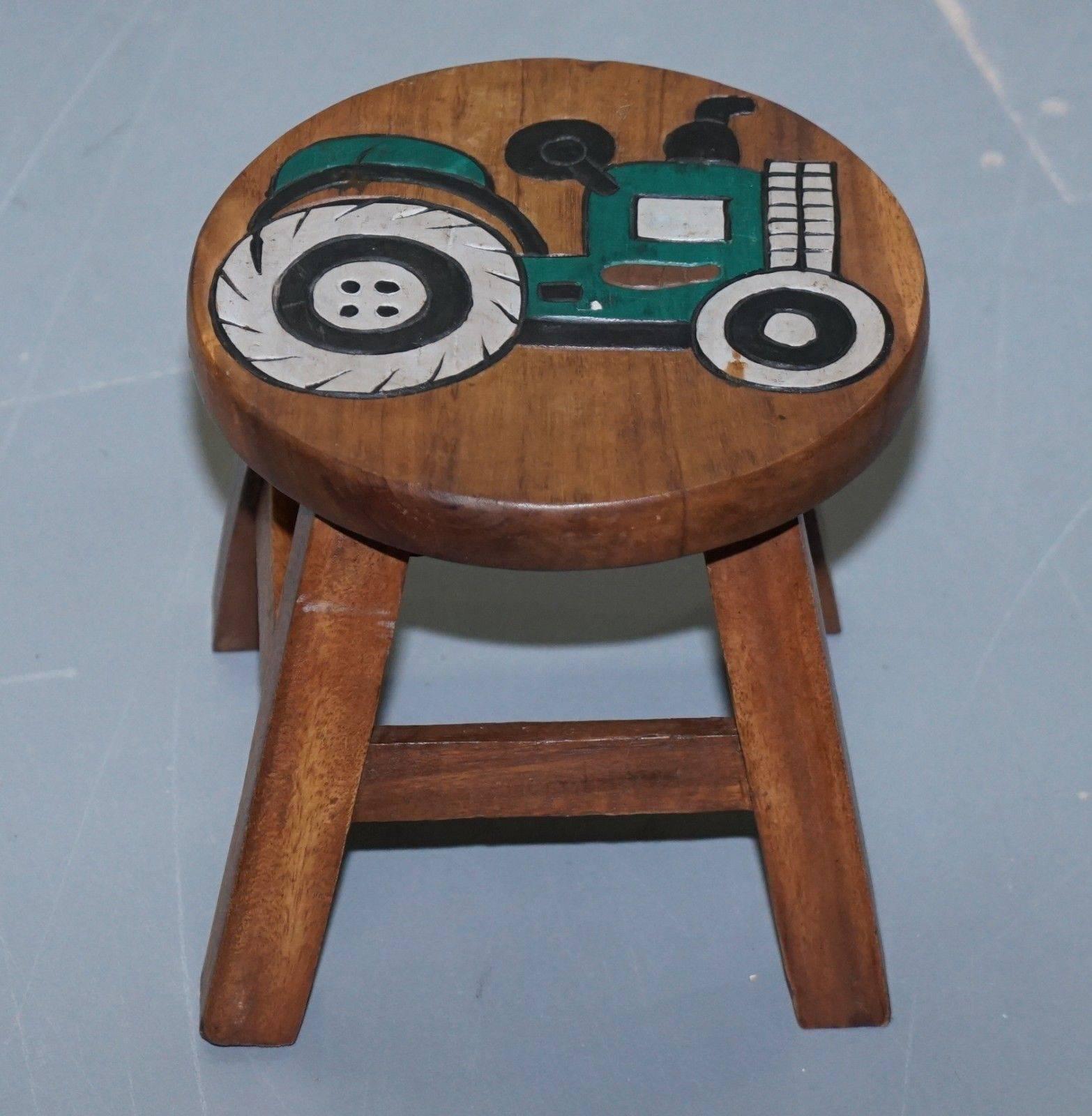 Hand-Carved Lovely Pair of Toddlers Children's Solid Wood Stools with Little Tractors on