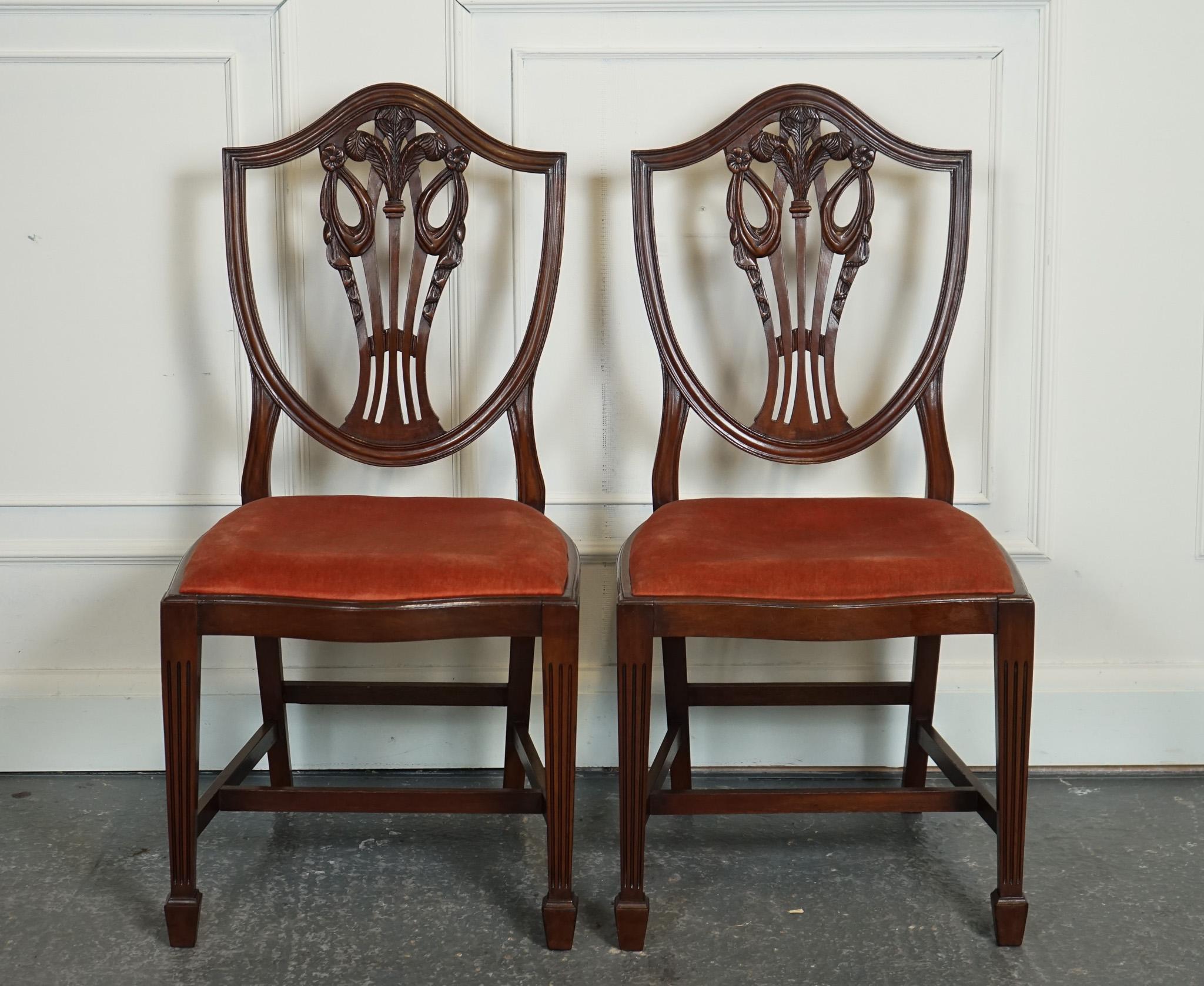 Antiques of London

We are delighted to offer for sale this Lovely Pair Of Victorian Hepplewhite Hallway Side Chairs.

These Victorian Hepplewhite hallway side chairs are truly lovely and exude an air of elegance and sophistication. Crafted during