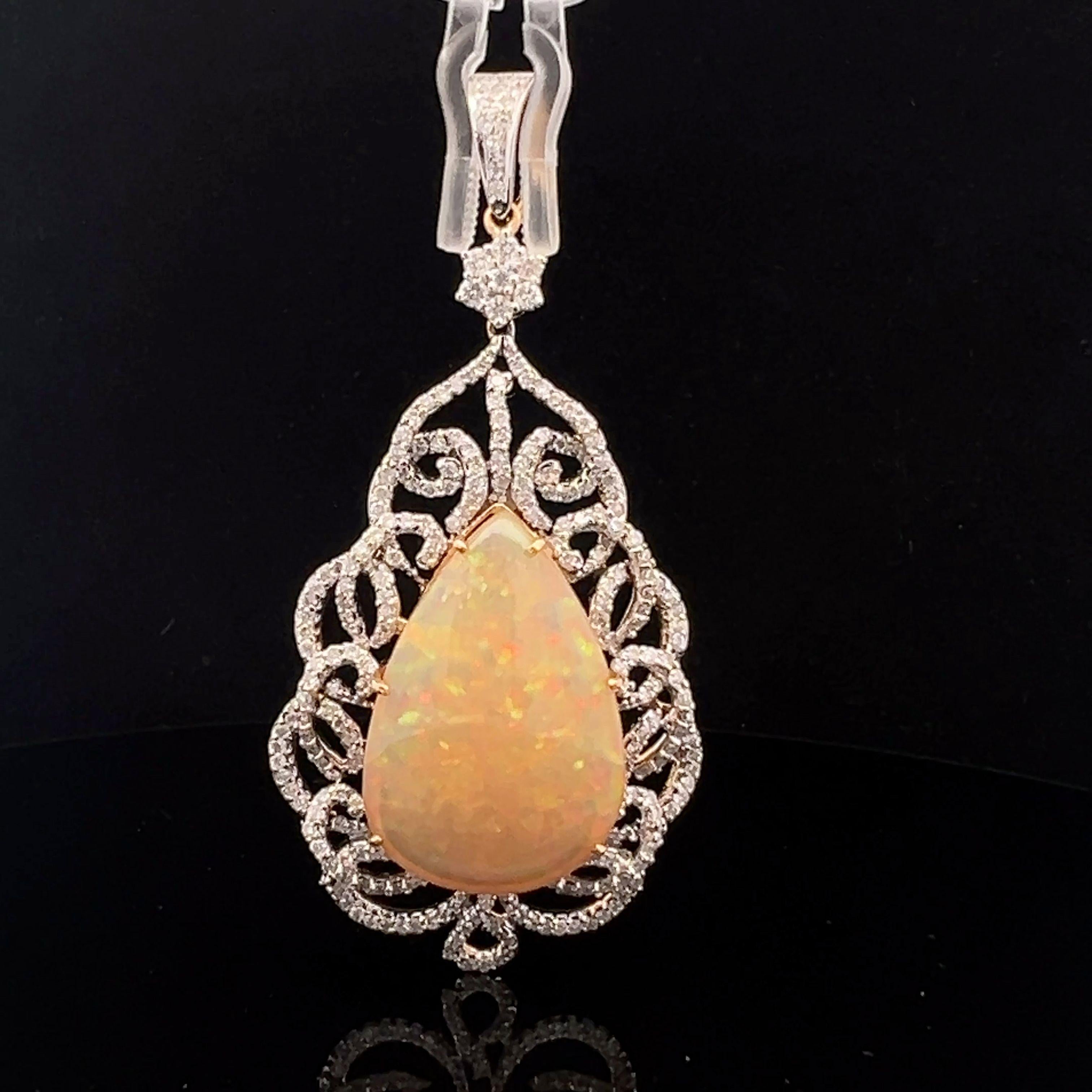 Mixed Cut Lovely pendant made of natural opal and diamonds in gold. For Sale