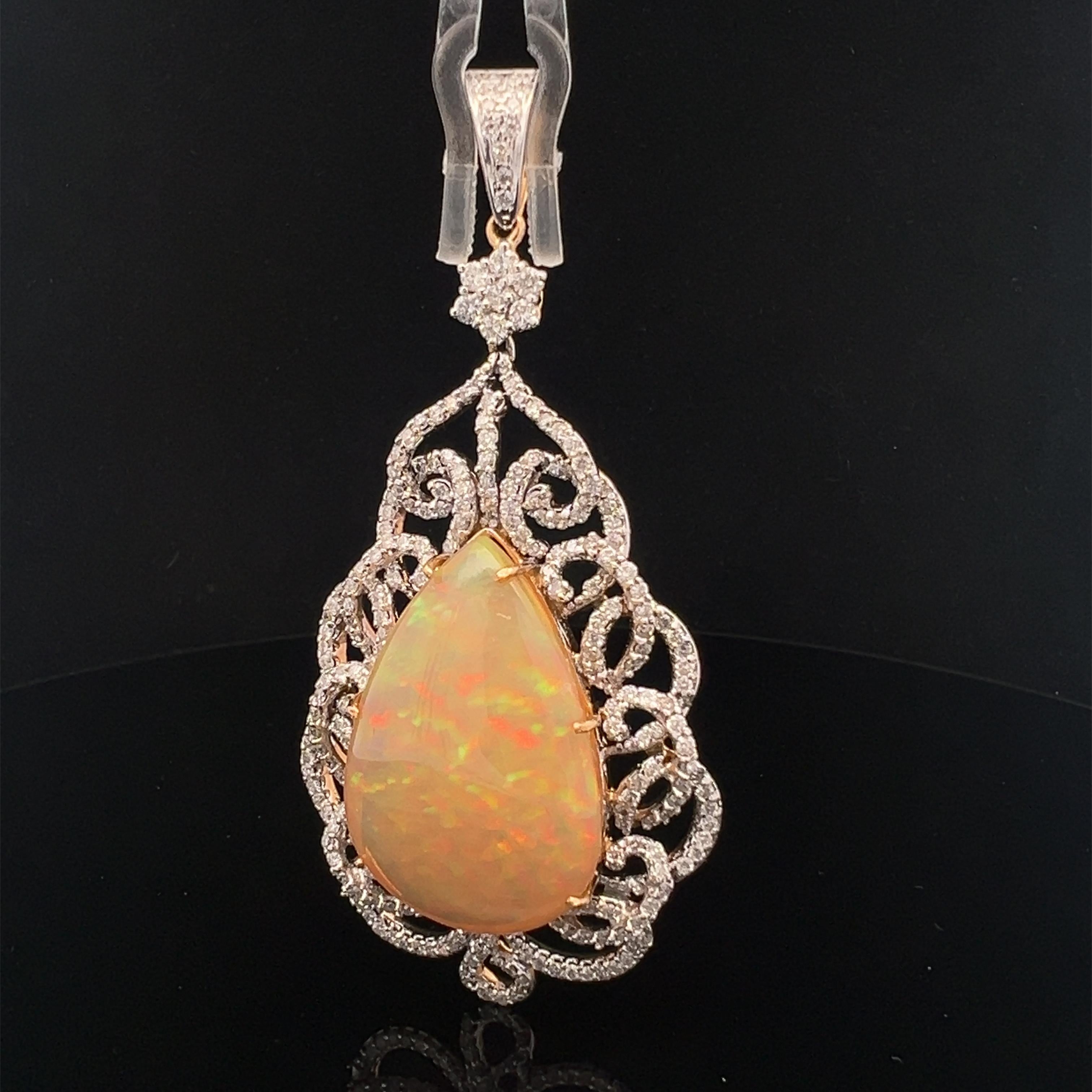 Lovely pendant made of natural opal and diamonds in gold. For Sale 2