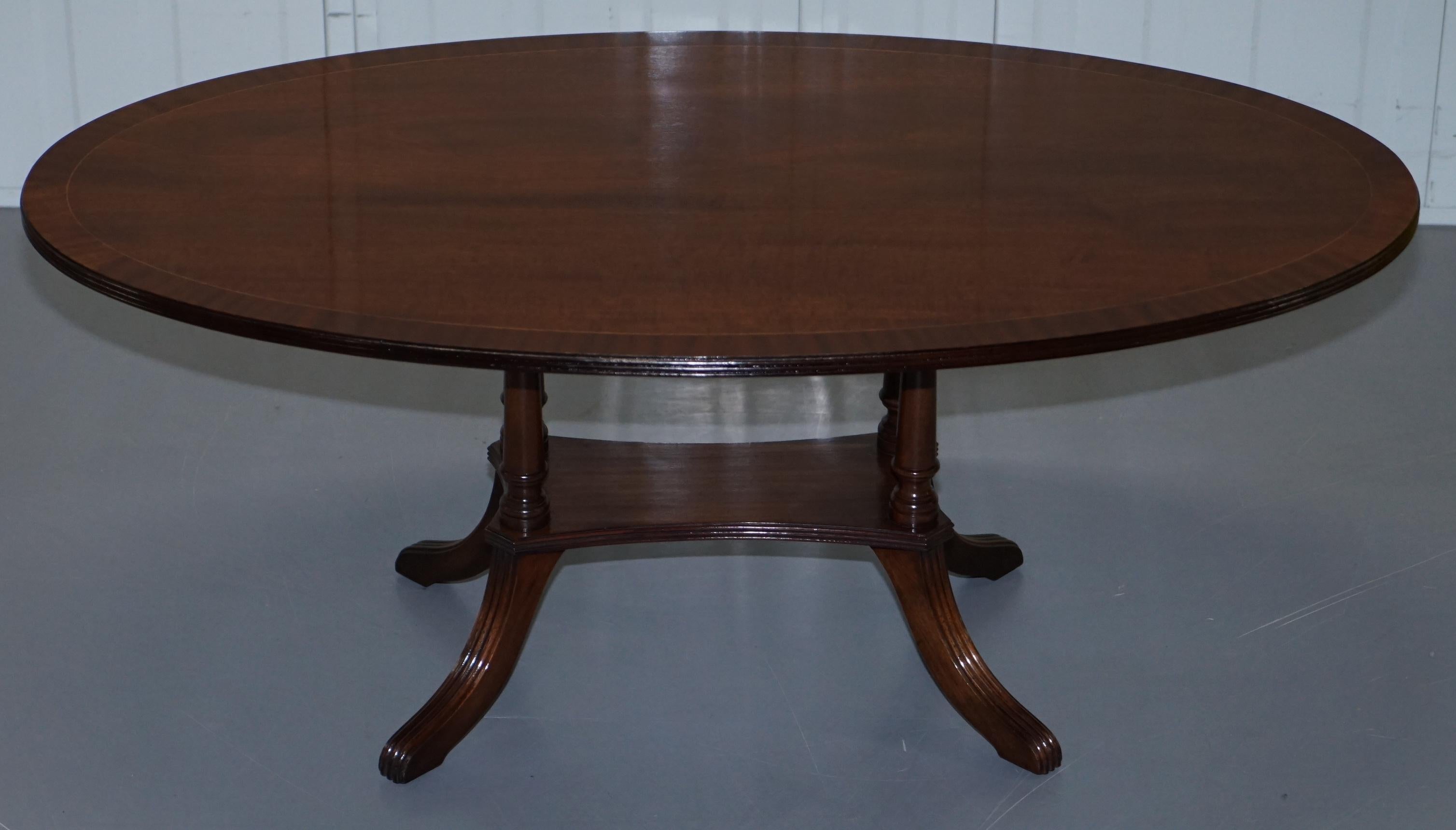 We are delighted to offer for sale this very nice vintage solid flamed mahogany coffee or cocktail table with nicely turned pillared legs

A good looking well made and decorative piece, the table top has a nice flamed mahogany finish with box wood