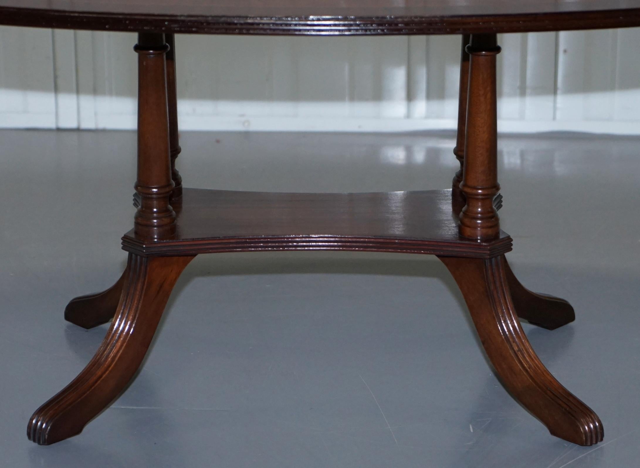 20th Century Lovely Pillared Leg Vintage Mahogany Oval Coffee or Cocktail Table Nice Vintage