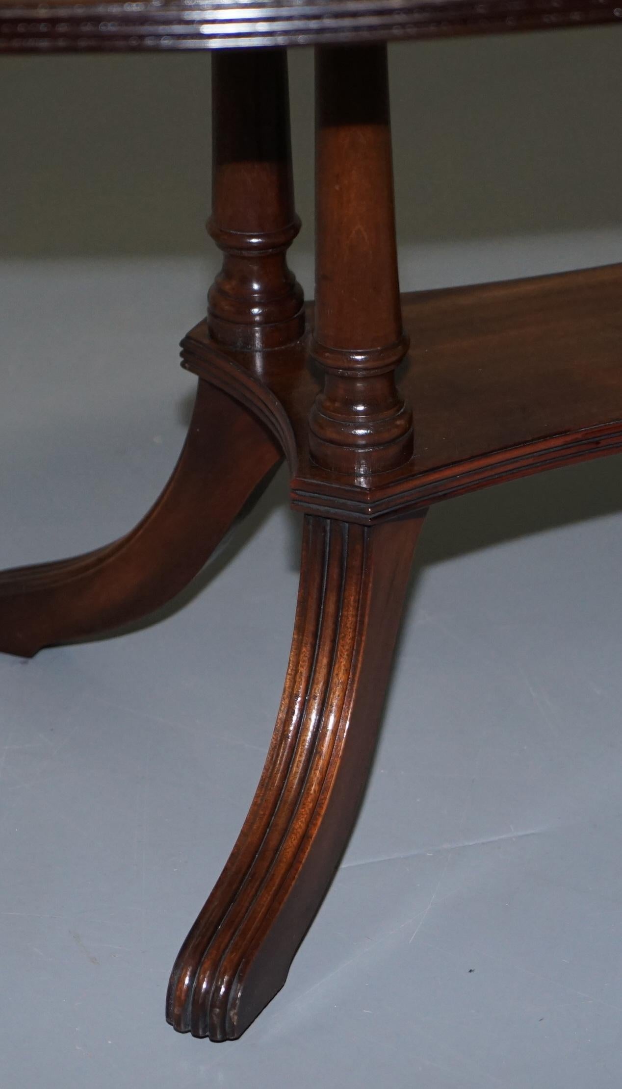 Lovely Pillared Leg Vintage Mahogany Oval Coffee or Cocktail Table Nice Vintage 1