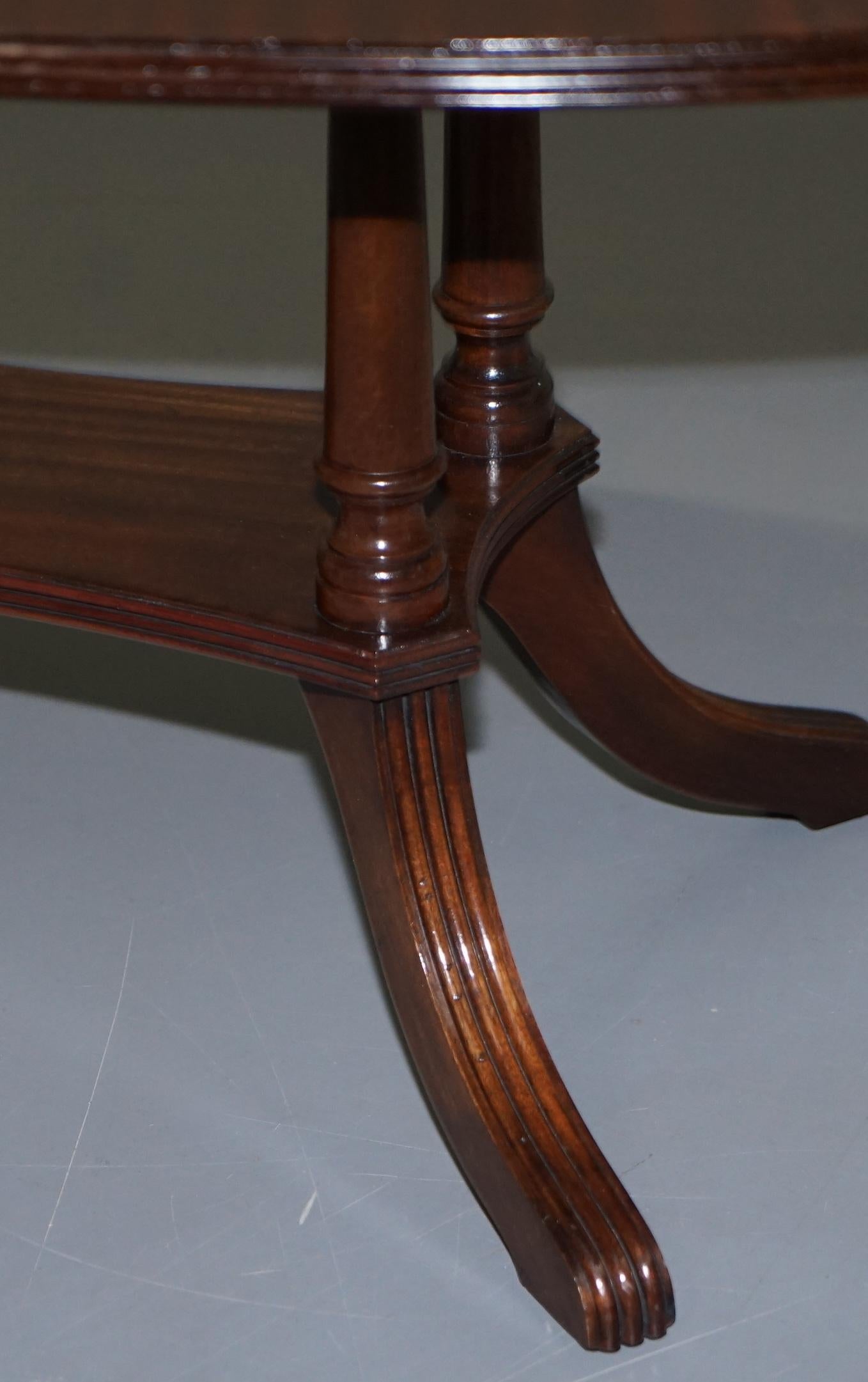 Lovely Pillared Leg Vintage Mahogany Oval Coffee or Cocktail Table Nice Vintage 1